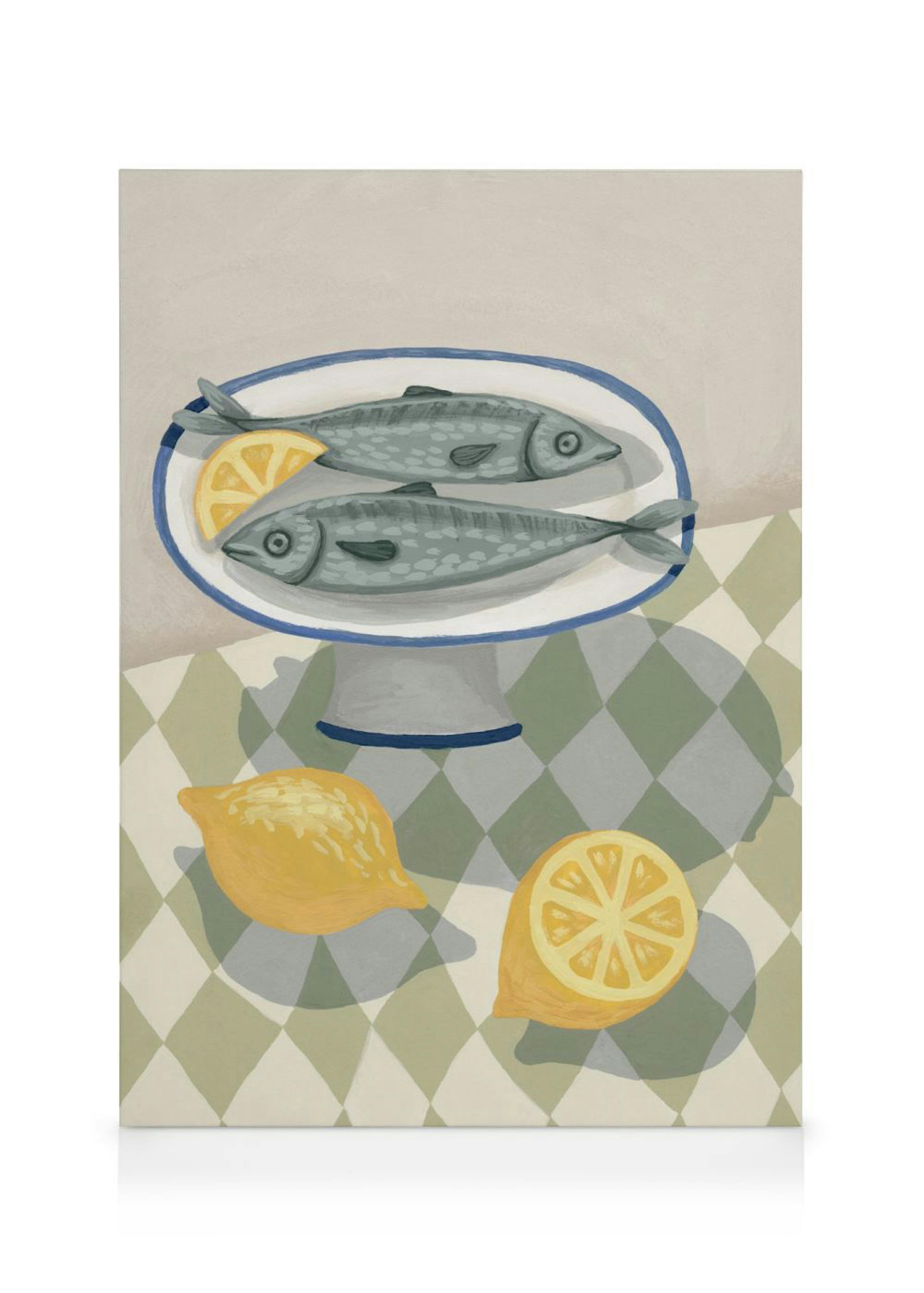 A canvas print of two fish on a plate with lemons and a green checkered tablecloth, hanging in a light-filled living room above 