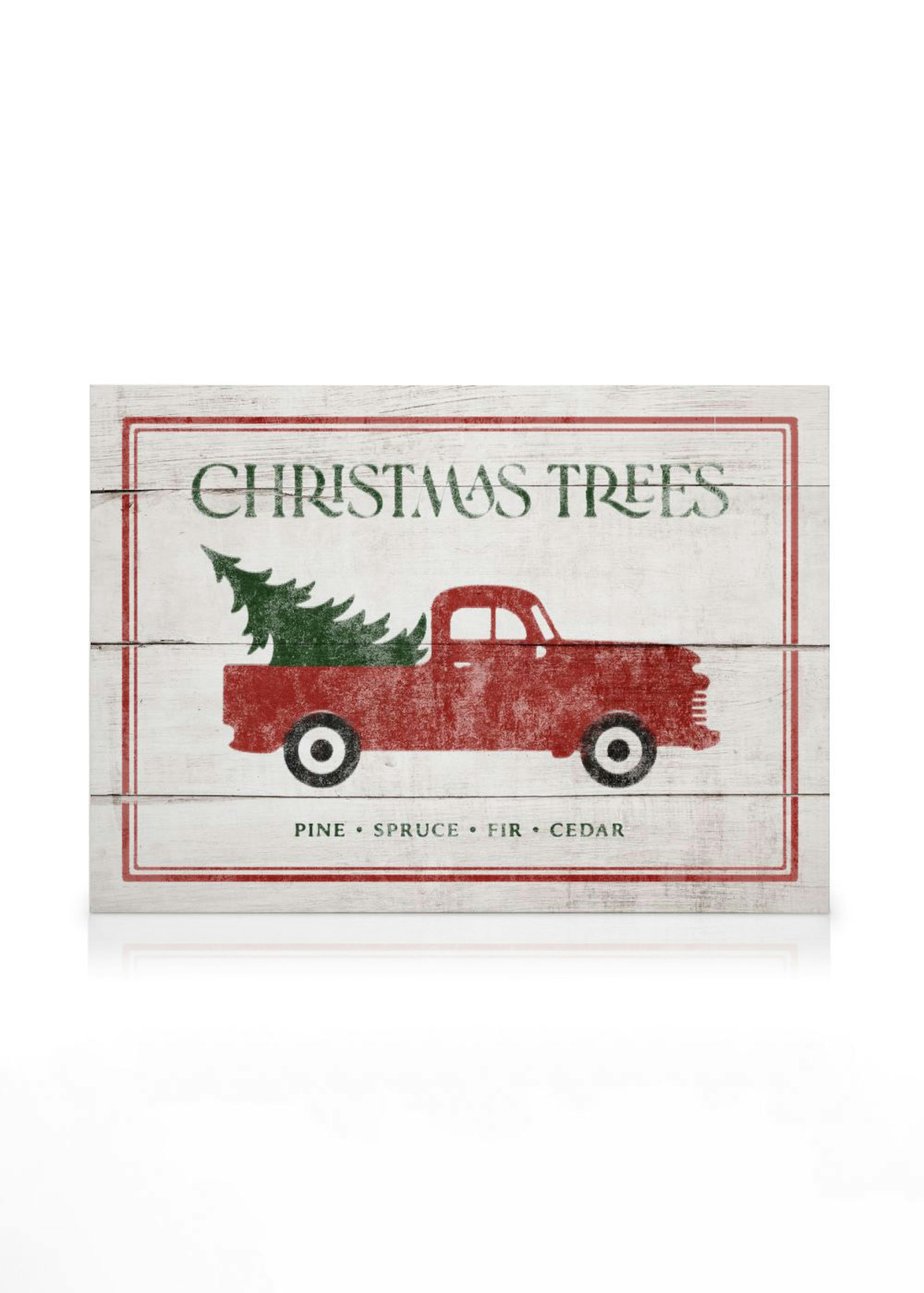 Vintage-Weihnachtsschild im Shabby Chic Stil mit rotem Pickup, der einen Weihnachtsbaum transportiert.