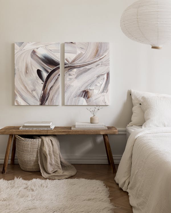 Beige, grey, black, and white abstract canvas duo with flowing paint strokes, enhancing calm home decor.