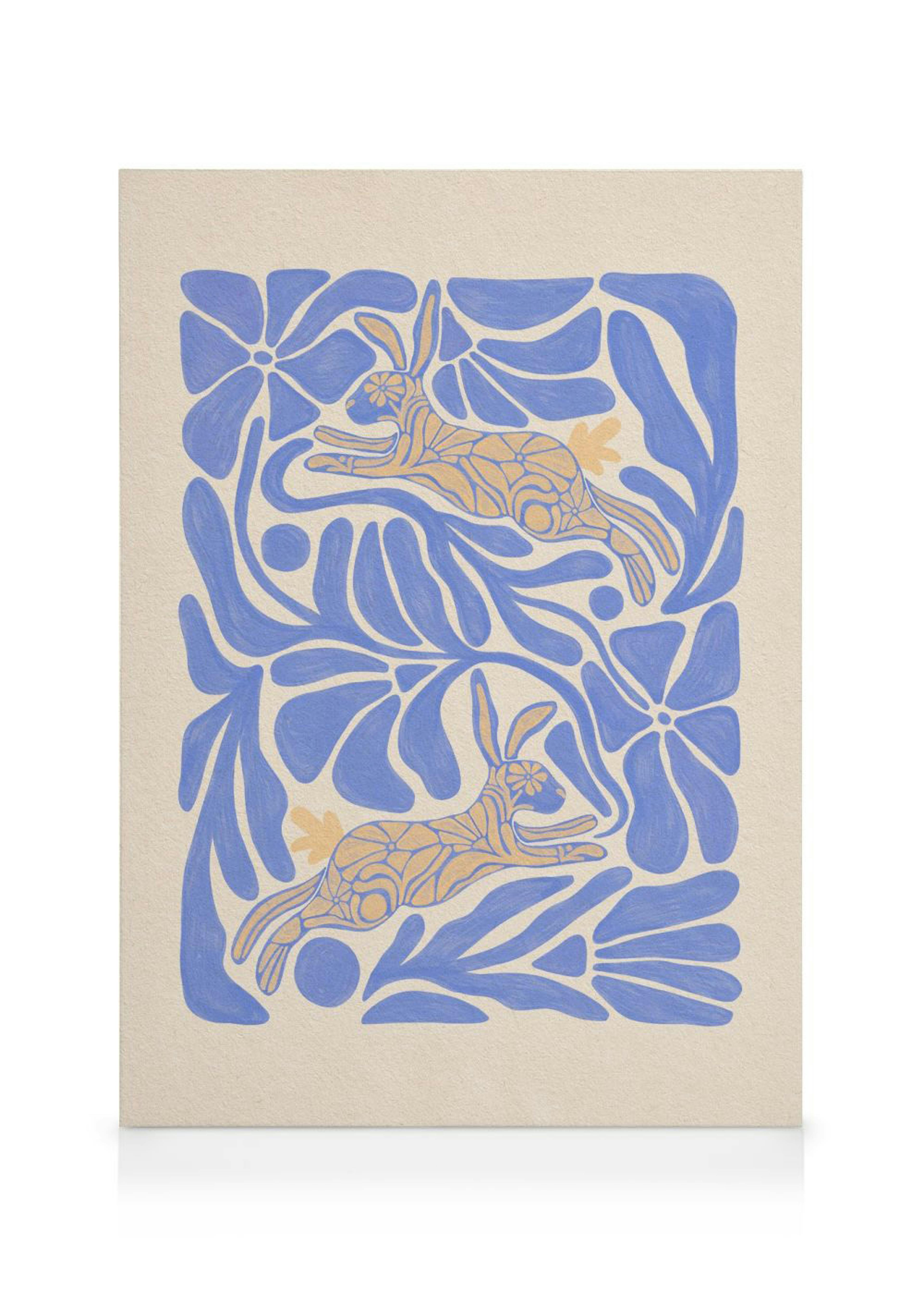 Canvas print with two yellow abstract rabbits among blue flowers on a cream background.
