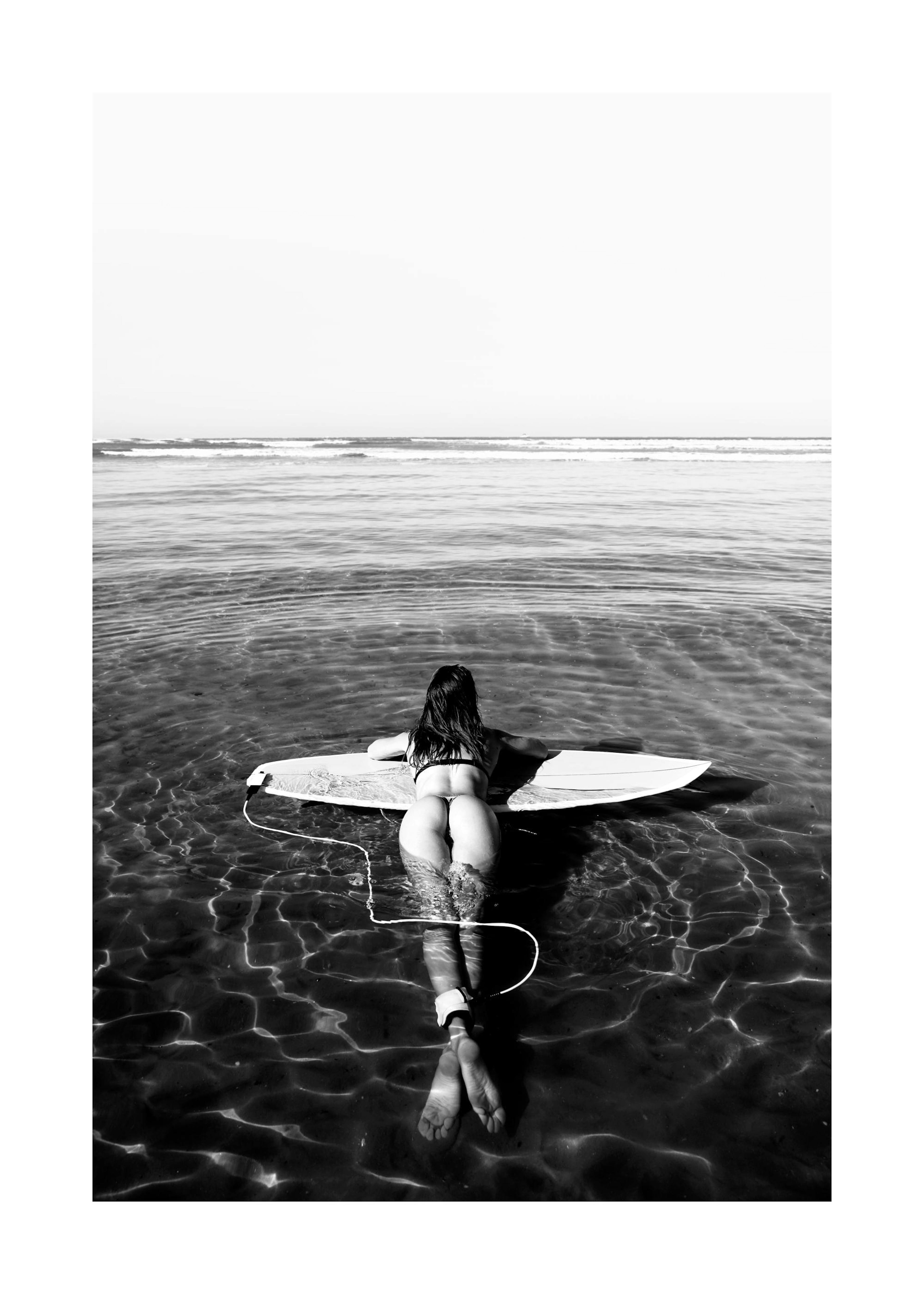 Floating on Surfboard Poster 0