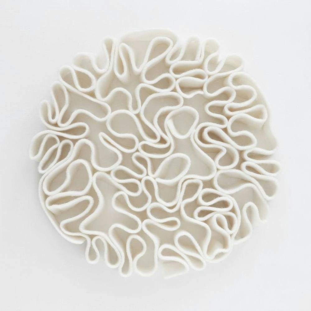 Abstract poster with white looping lines forming a circular pattern, creating a 3D effect on a white background.
