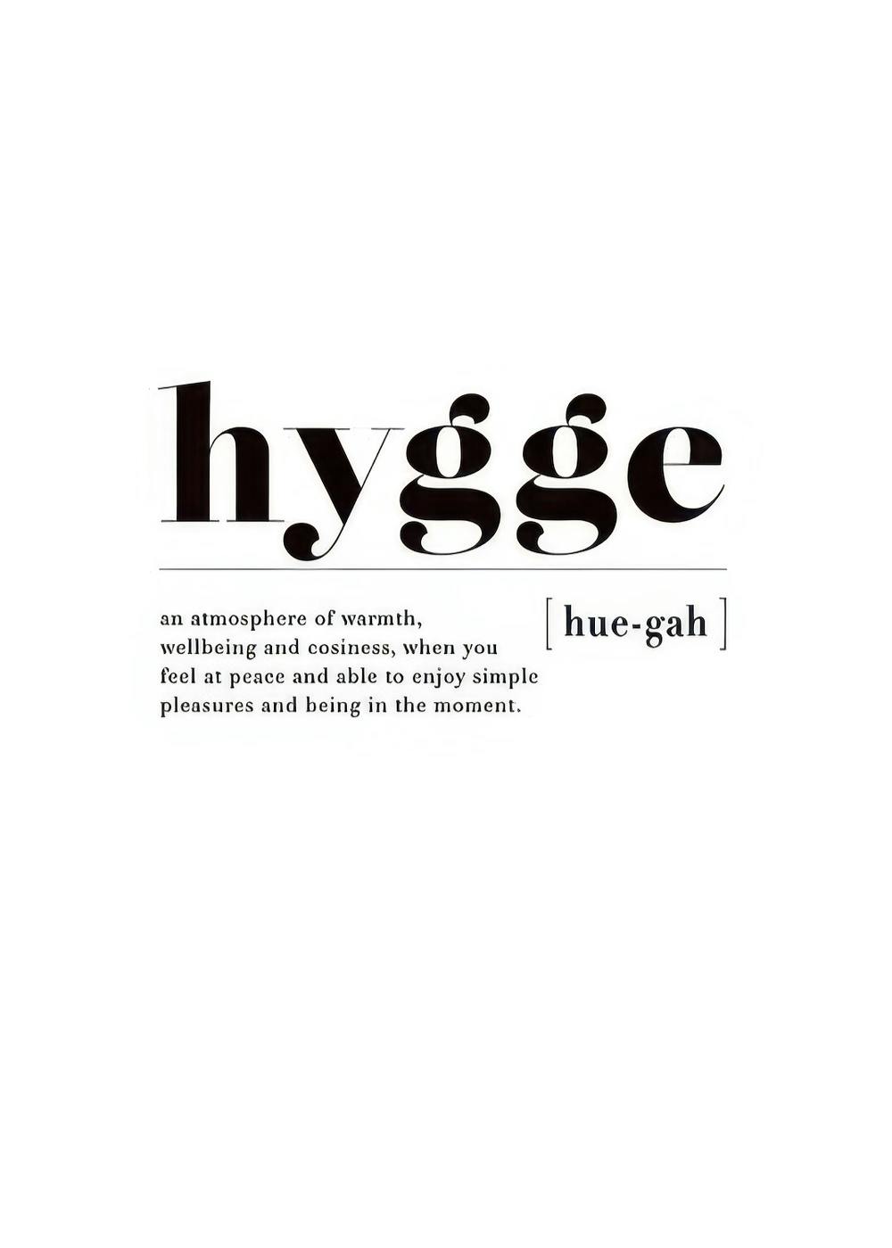 Black and white Hygge definition poster with the word hygge in large font and its meaning below in smaller text.