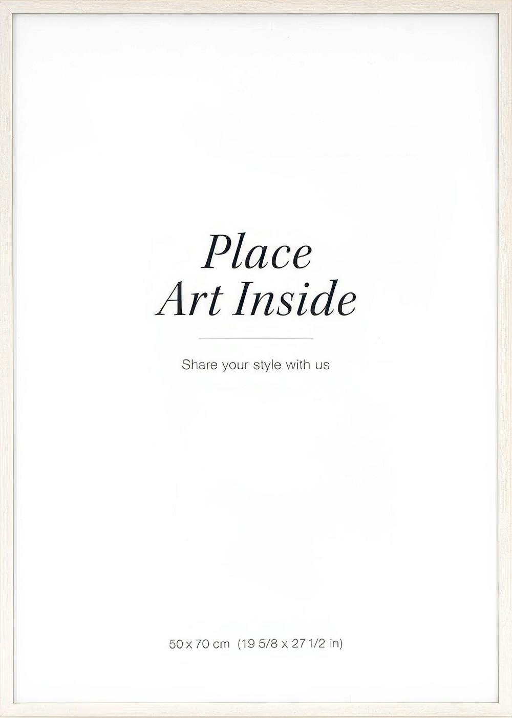 Light wood frame with visible grain, featuring a white insert with Place Art Inside text.