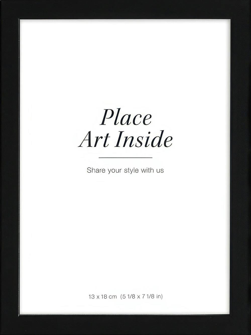 黒色の木製フレーム、白い中央に「Place Art Inside」の文字