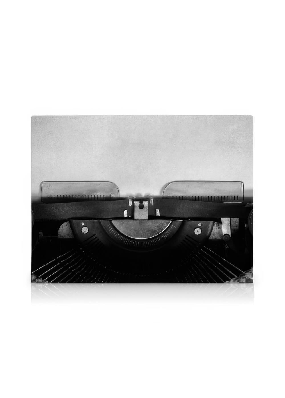 Toile vintage noir et blanc dune machine à écrire, typographie, touches rondes et barres métalliques