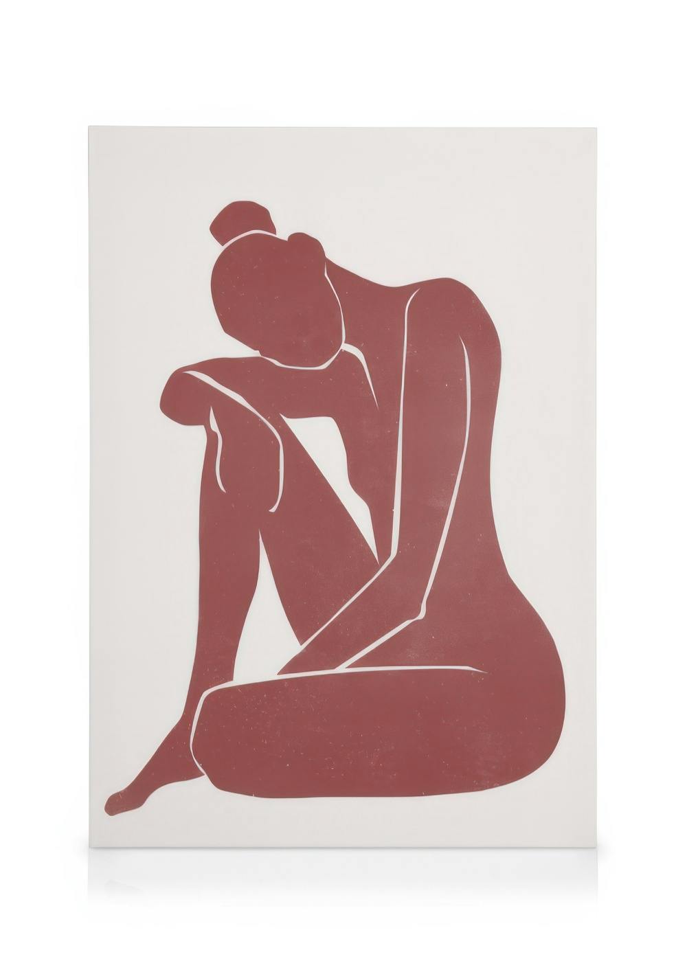 Obraz na płótnie: burgundowa sylwetka osoby obejmującej kolana na białym tle, minimalistyczny wygląd, nowoczesna sztuka.