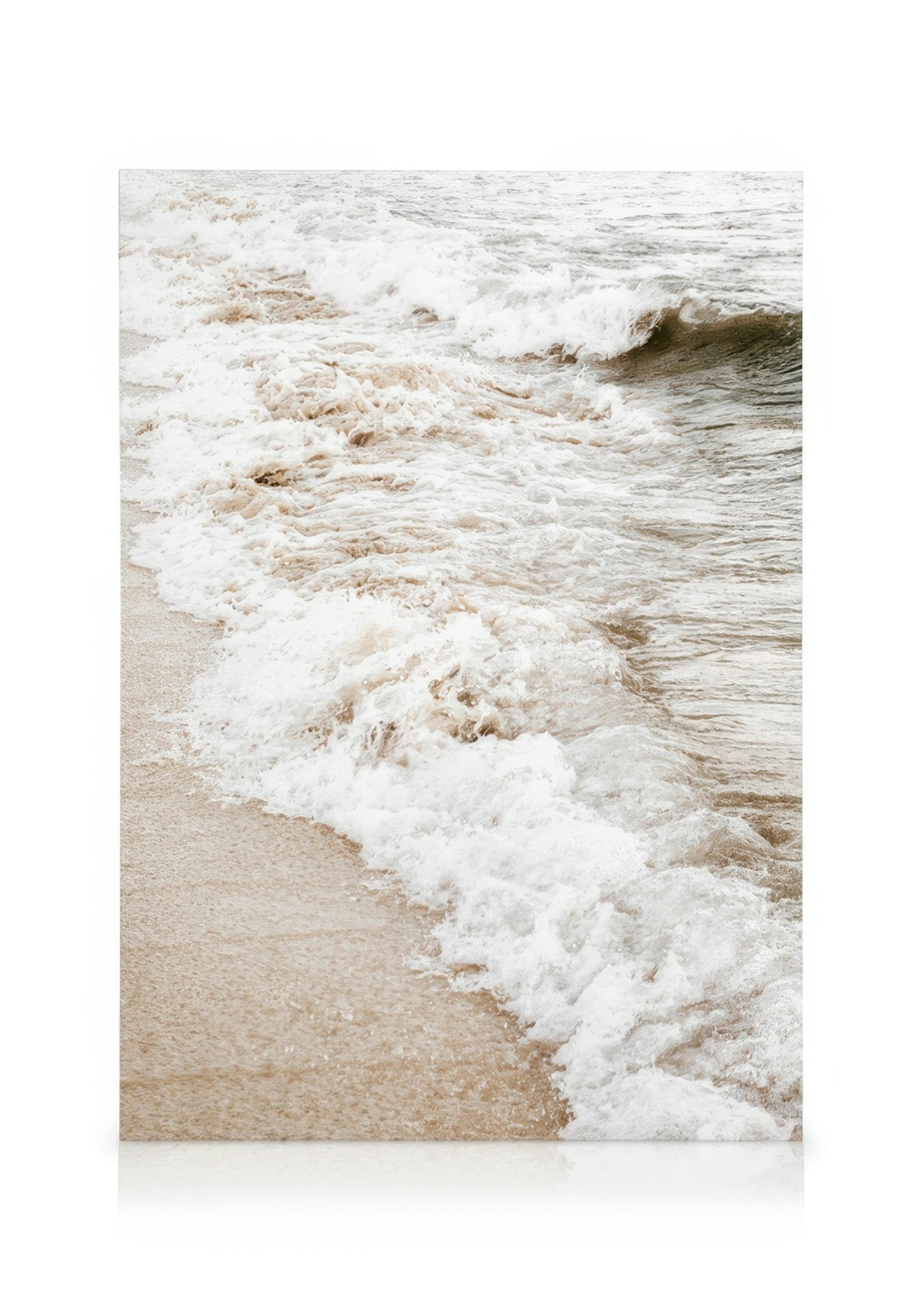 Beautiful beige and tan waves crashing on a sandy beach canvas print