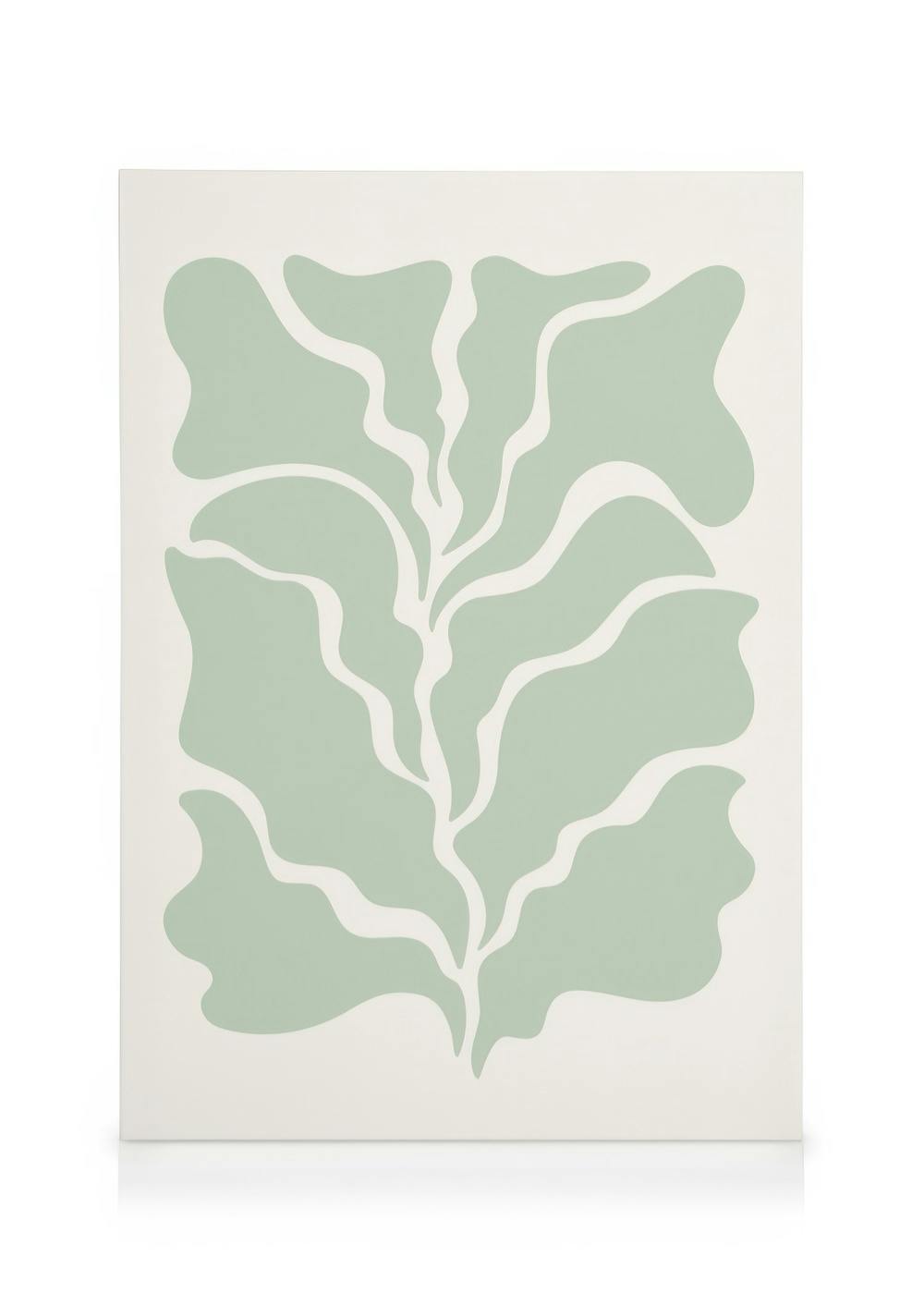 Green leaf canvas print featuring an abstract botanical design with stylised leaves in sage green on a beige background.