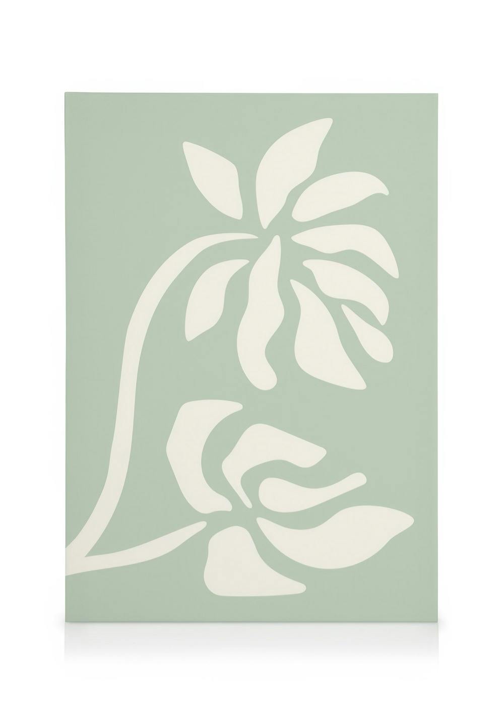 Toile florale verte avec un motif de découpe botanique blanc. Tableau Toile abstrait végétal.