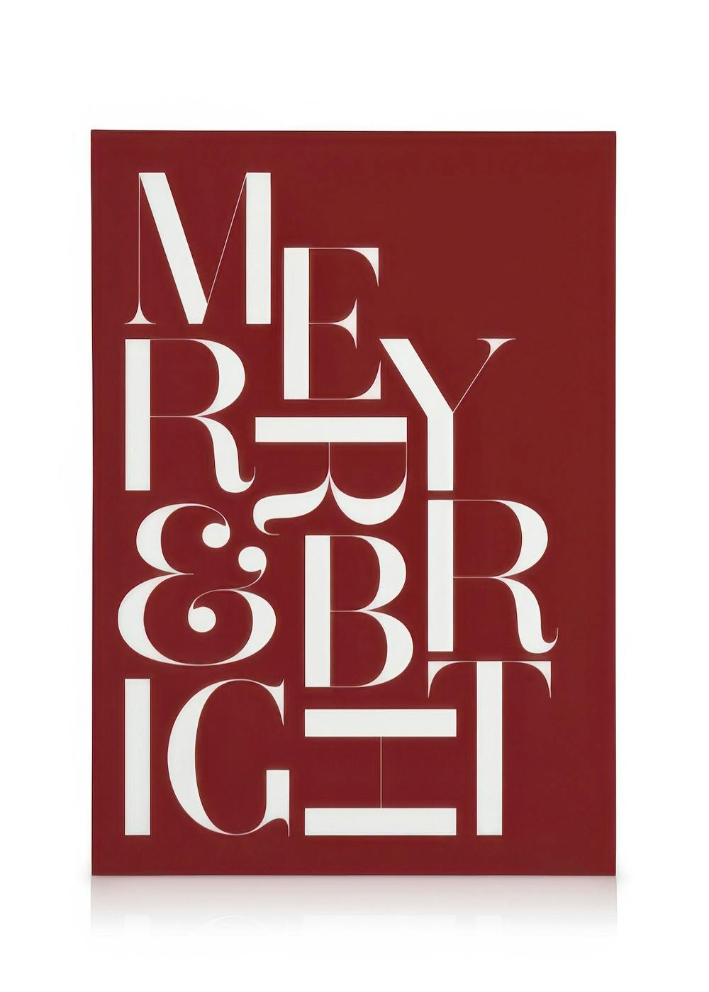 Modern red canvas print with Merry & Bright in white serif font