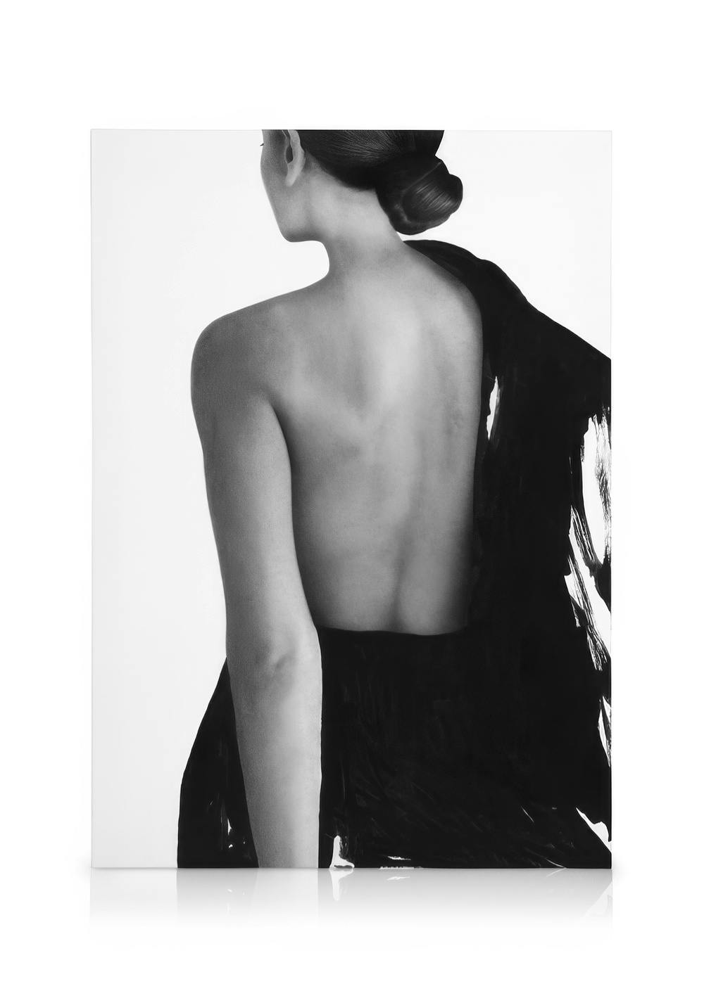 Monochromatic canvas art of a womans back, draped in an expressive, painterly black garment. Female sketch wall decor.