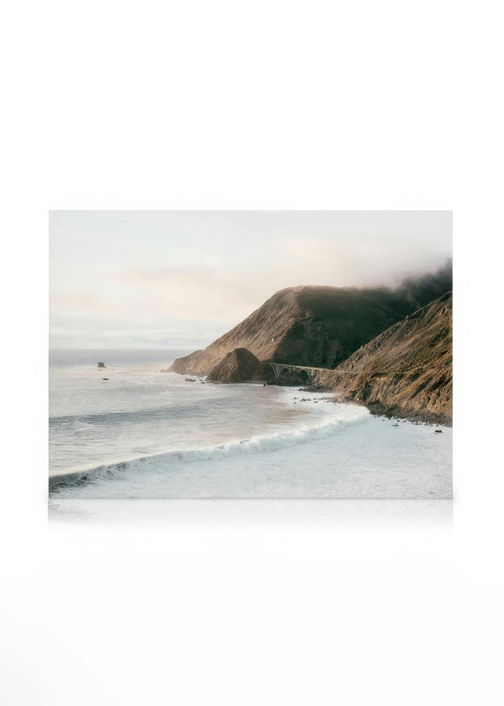 Canvas Schilderijen Sunset over Big Sur Canvas (50x70 cm - Fotolijst Zwart)