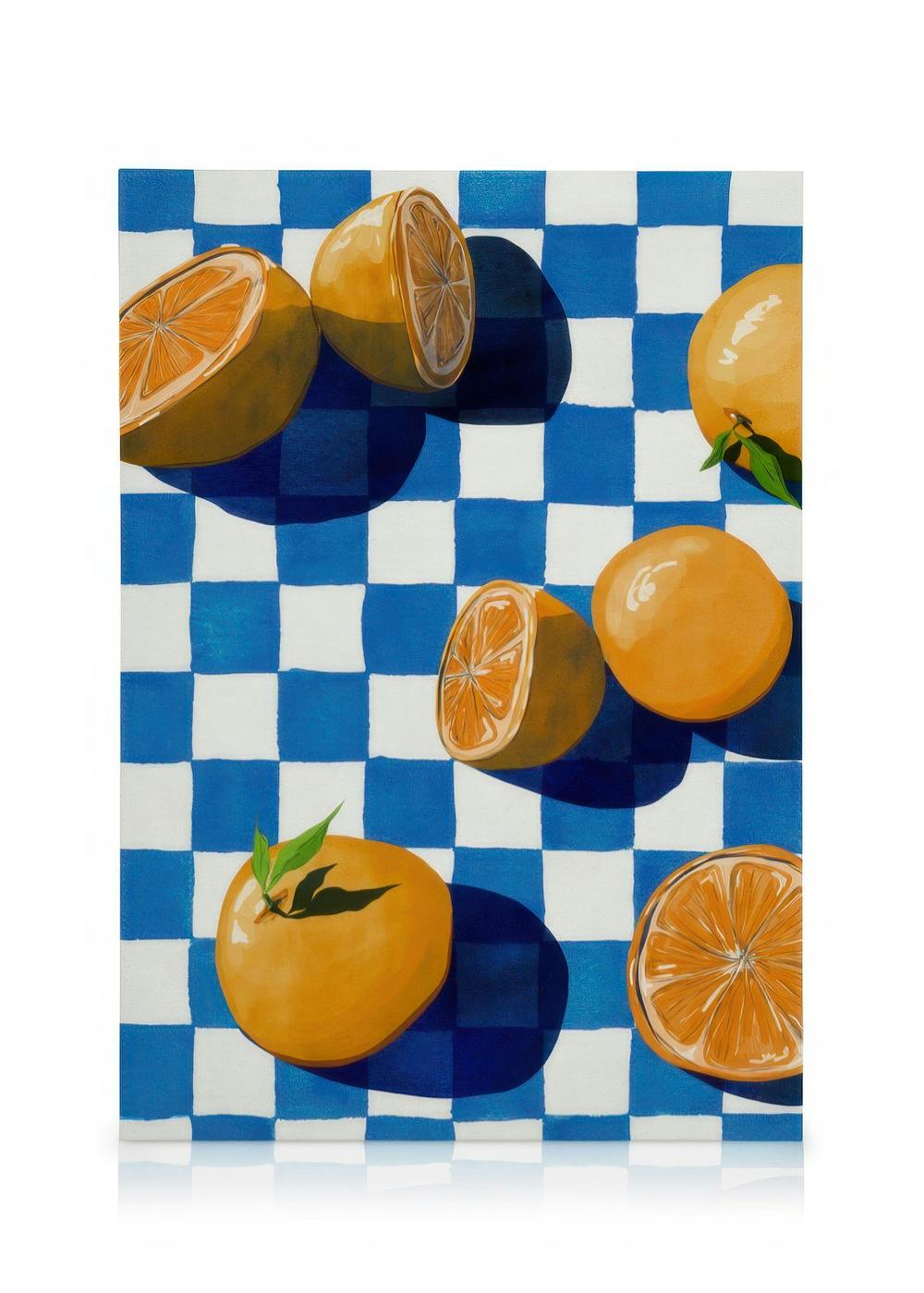 Toile doranges éclatantes sur fond à carreaux bleu et blanc, parfait pour une cuisine ou salle à manger