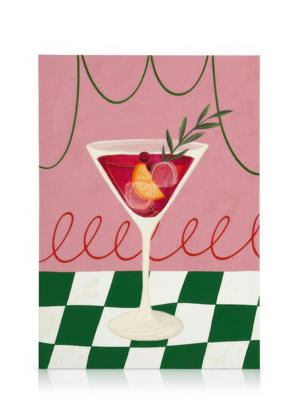 Obraz na płótnie: kieliszek martini z czerwonym koktajlem, pomarańczą, lodem, na różowym tle z zielono-białą szachownicą.