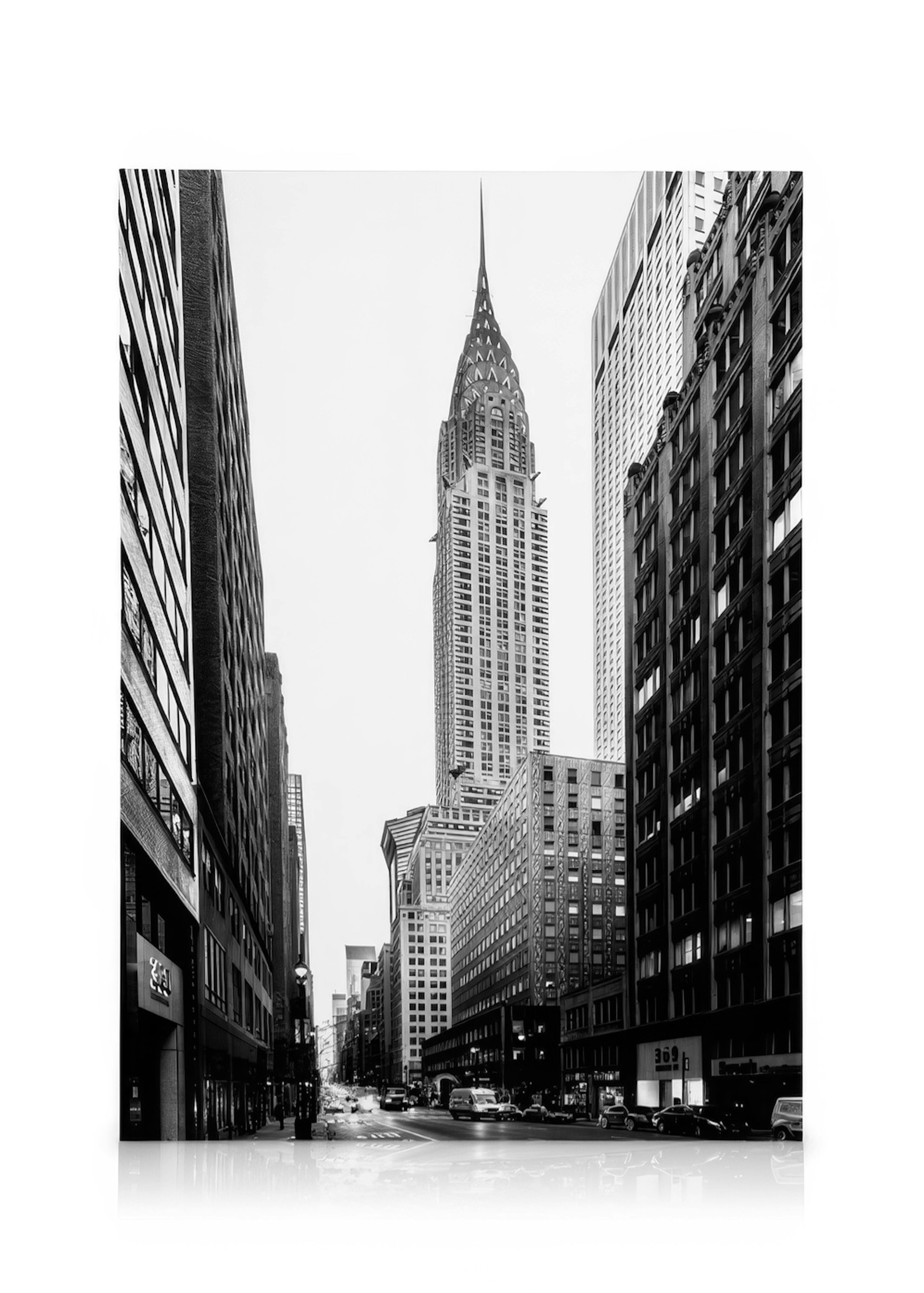 Black and white NYC street with Chrysler Building, tall buildings, and busy road, on canvas print.