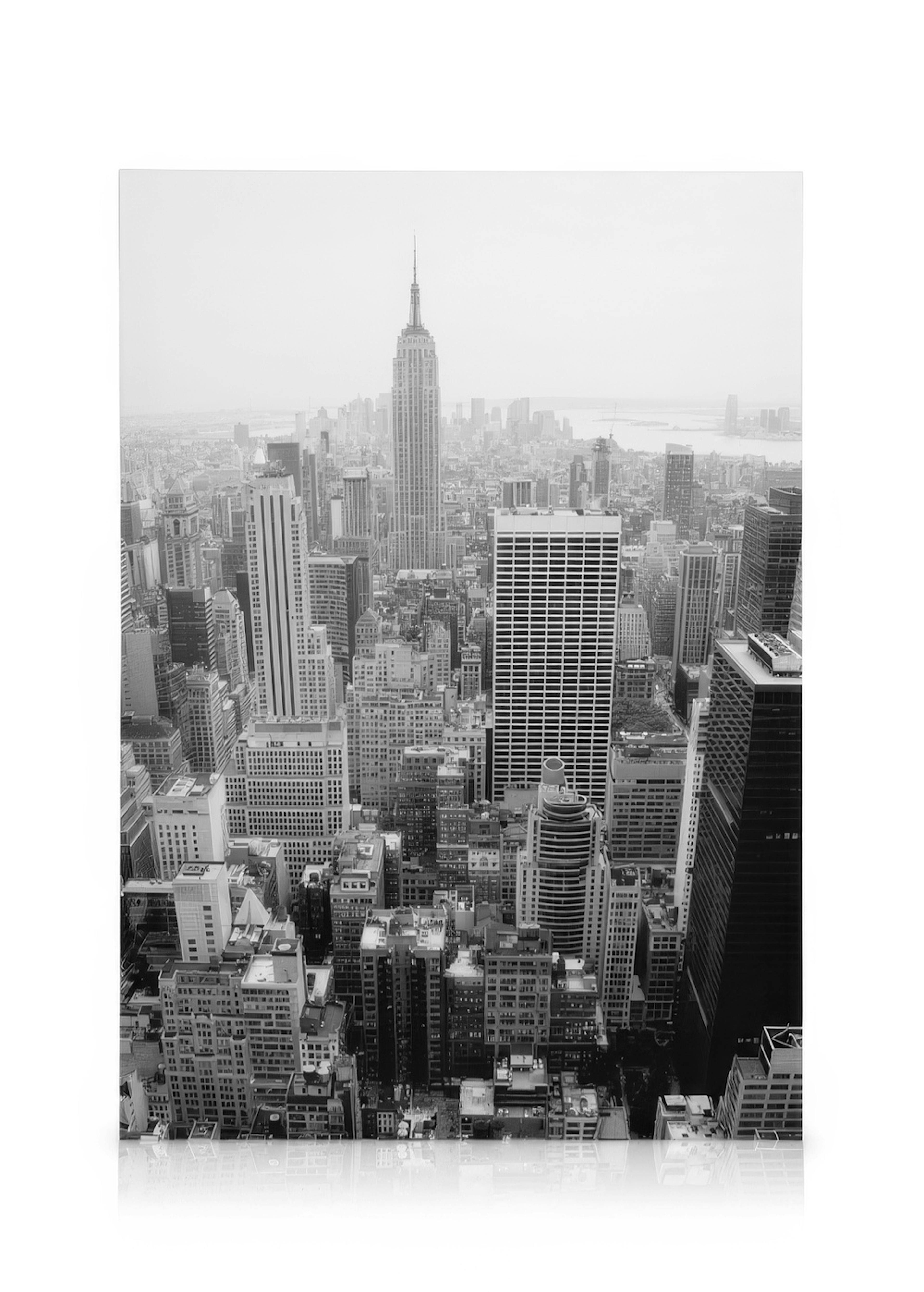 Black and white canvas print of the New York City skyline with the Empire State Building, displayed in a modern living room.