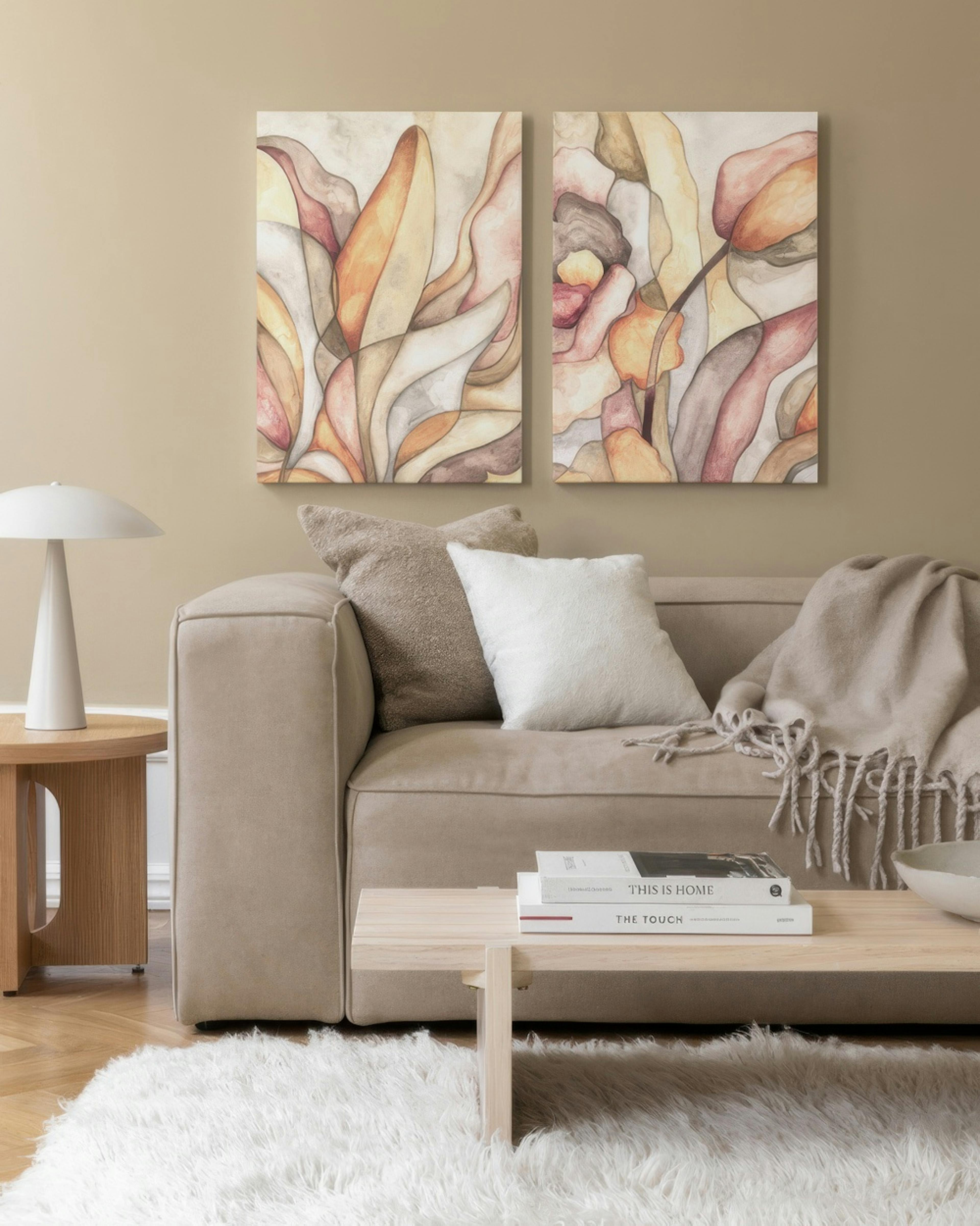 Two botanical shapes canvas art pieces in yellow, orange, pink, and beige, with a soft, creative feel