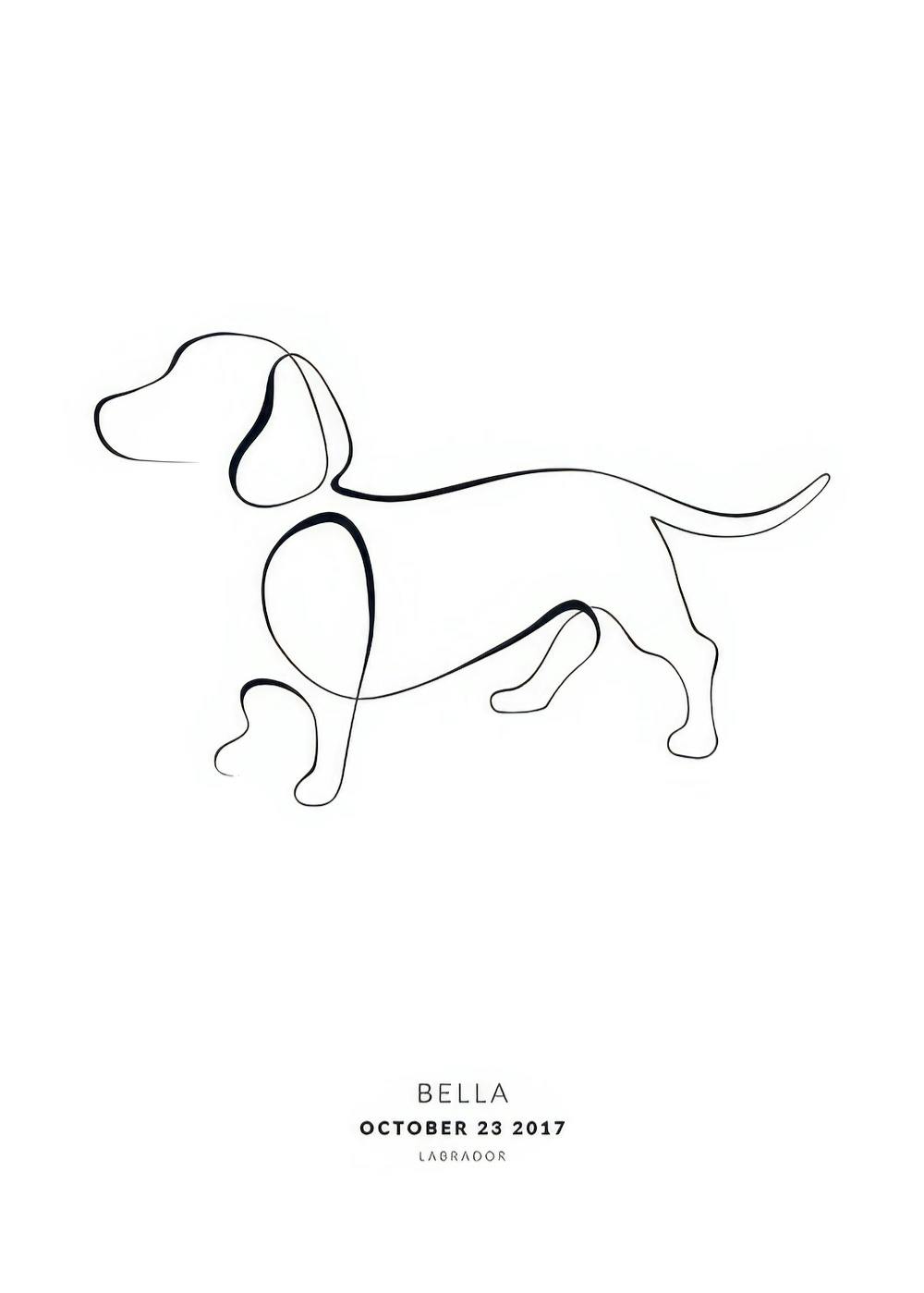 Personalised print with a black continuous line drawing of a dog, hanging above a wooden desk with a lamp and vases.