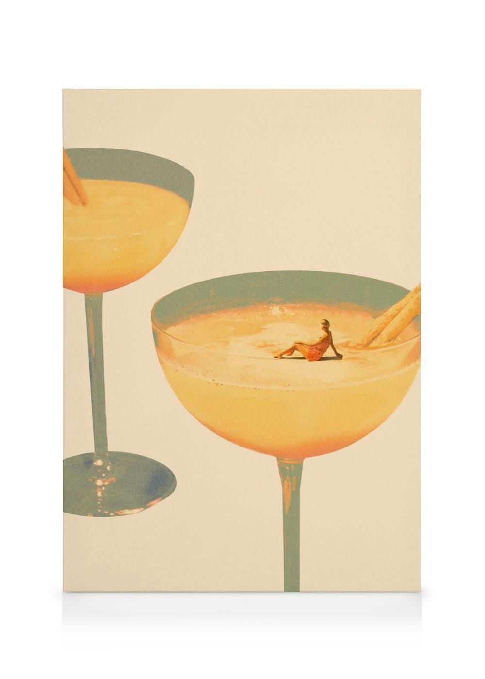 Stampa su tela con due bicchieri da cocktail, uno con una persona che prende il sole nellarancia.