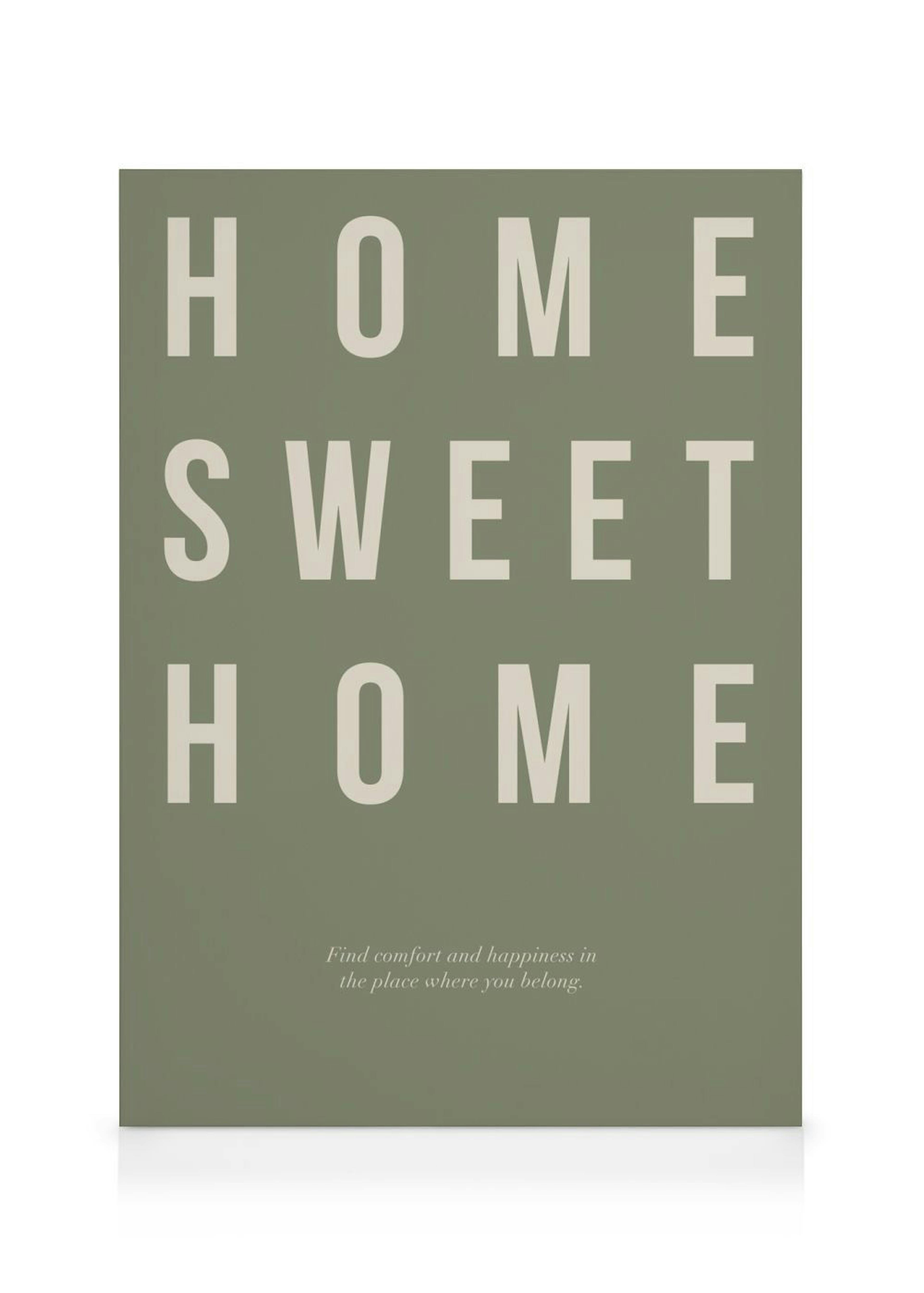 Tela decorativa verde com a frase HOME SWEET HOME em letras bege e uma citação inspiradora.