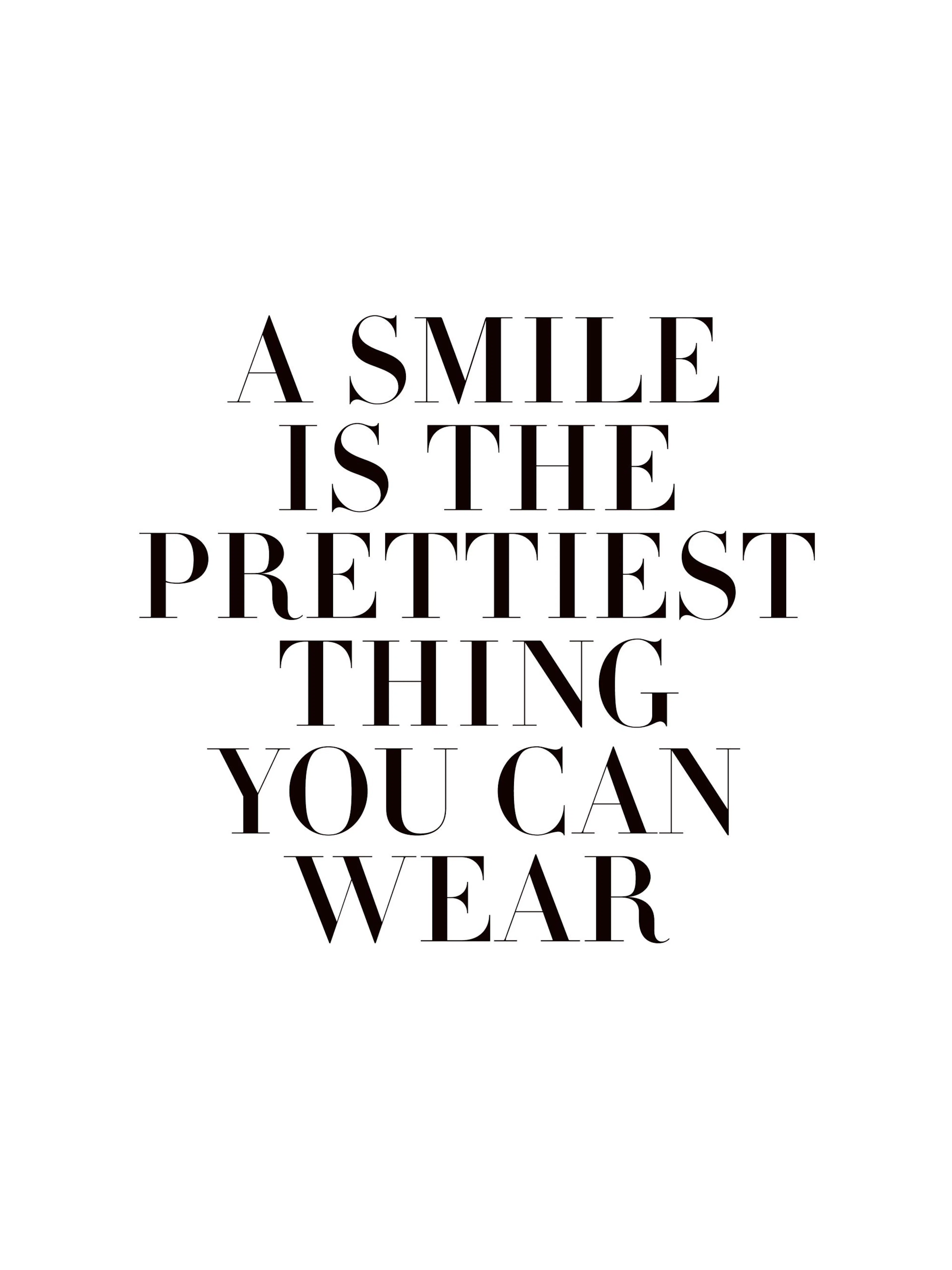 Black text on white background quote poster with A SMILE IS THE PRETTIEST THING YOU CAN WEAR in serif font. Motivational wall ar