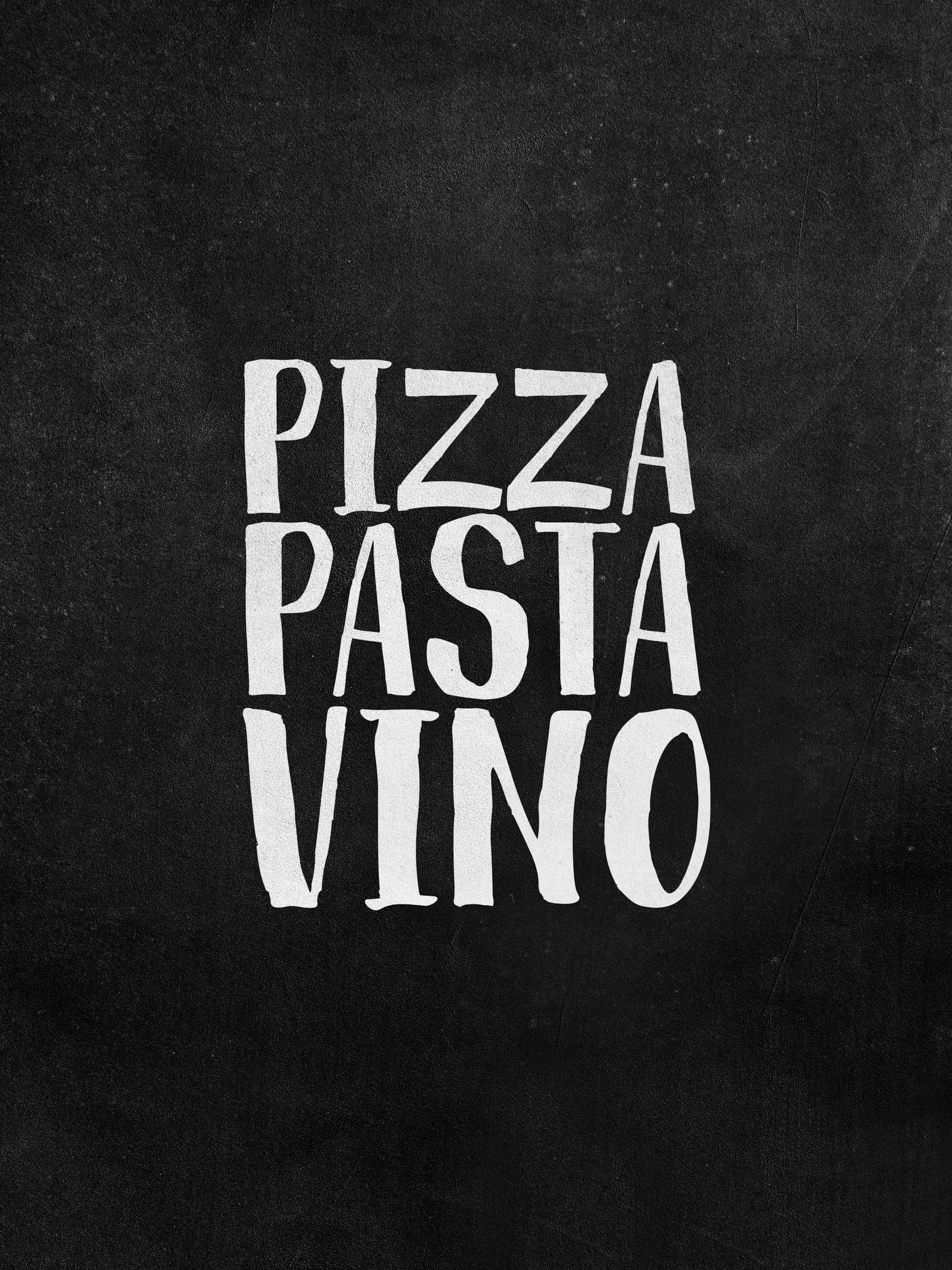 Black poster print with Pizza Pasta Vino in white chalkboard text, perfect for kitchen decor.
