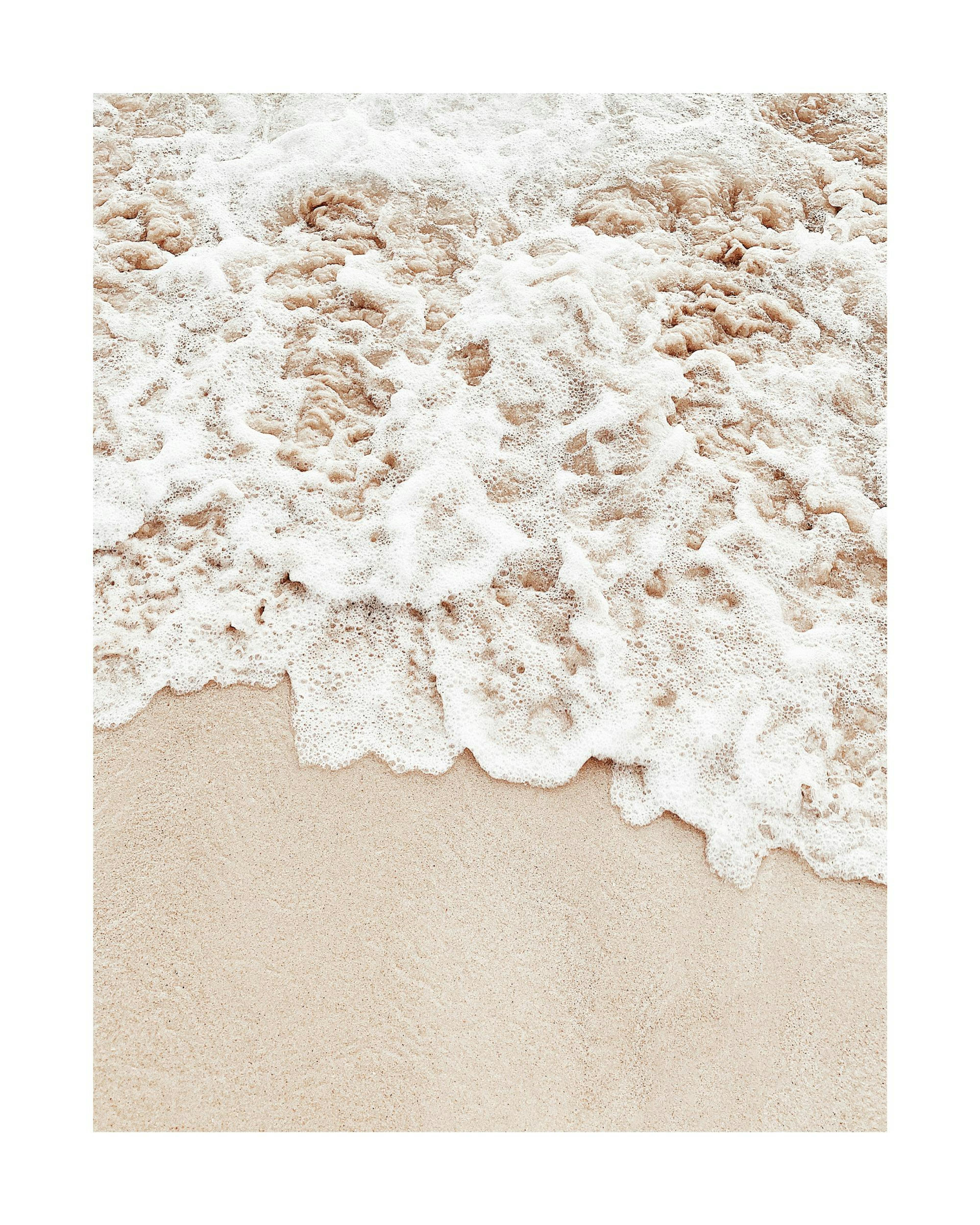 Photograph print of beige sand and white sea foam on a beach, a calming poster for home decor.