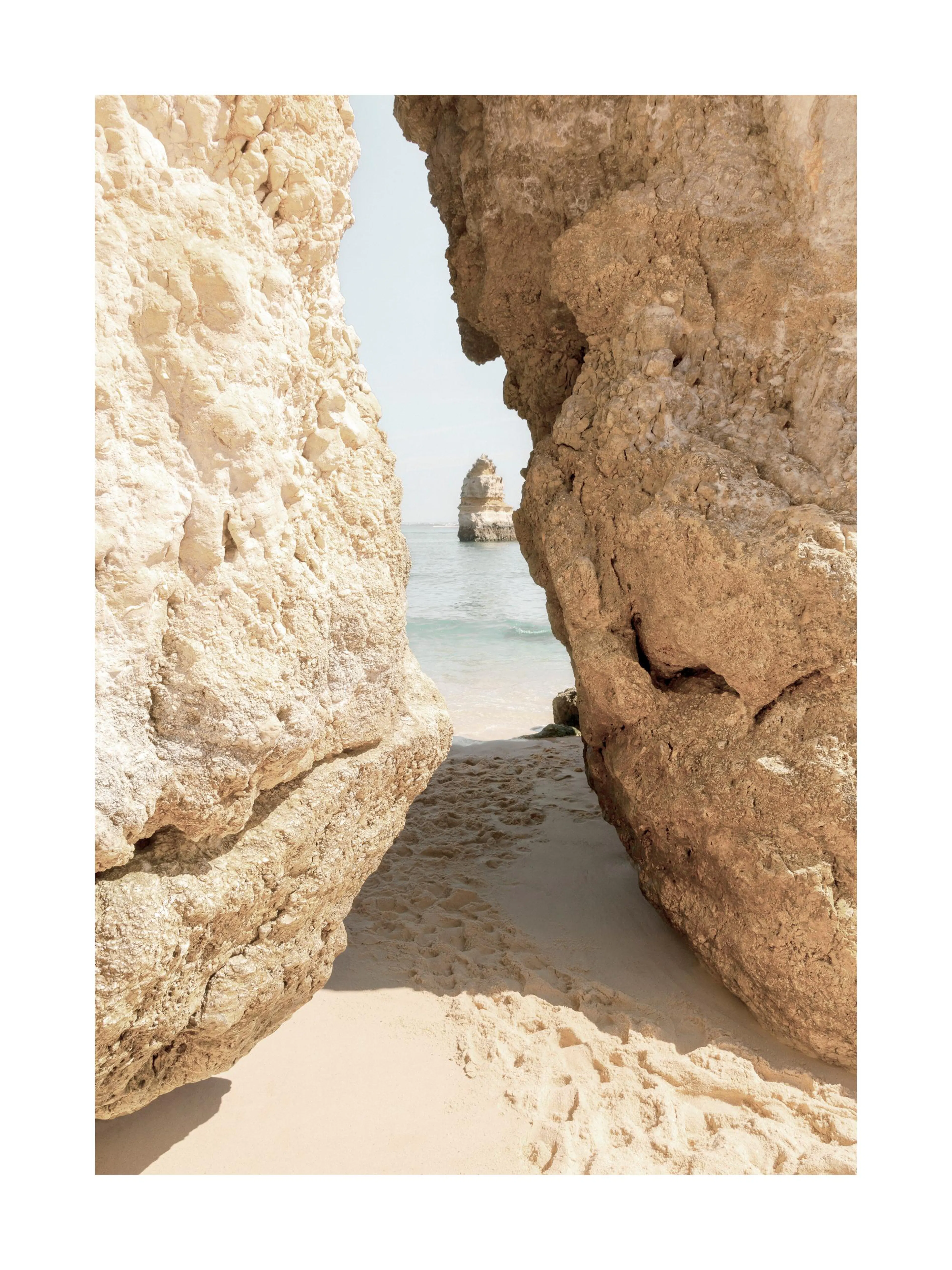 Algarve cliffs in beige with footsteps leading to the sea, a serene beach landscape poster.