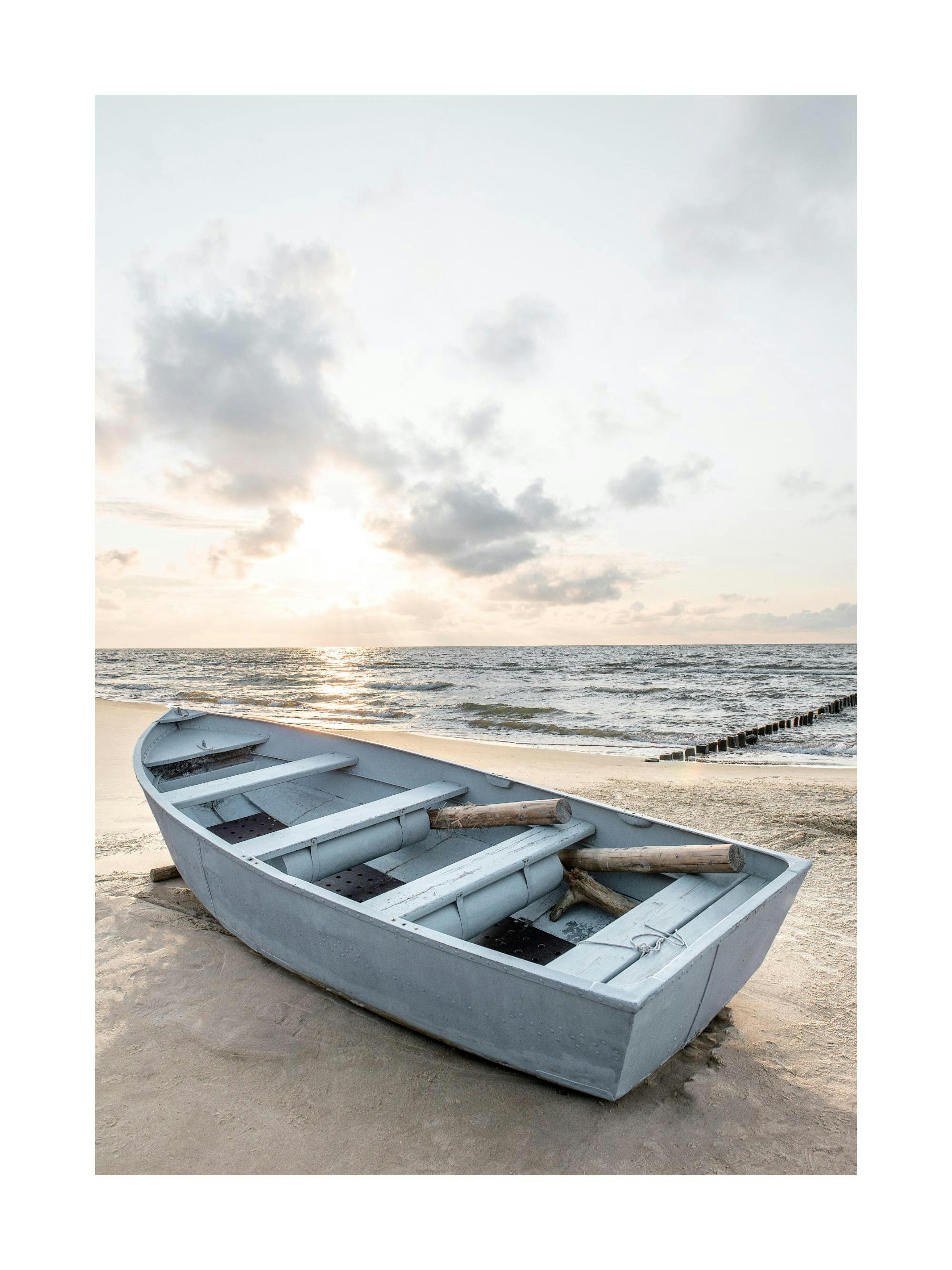 Fishing boat on the sand by the water in the sunrise photography print poster