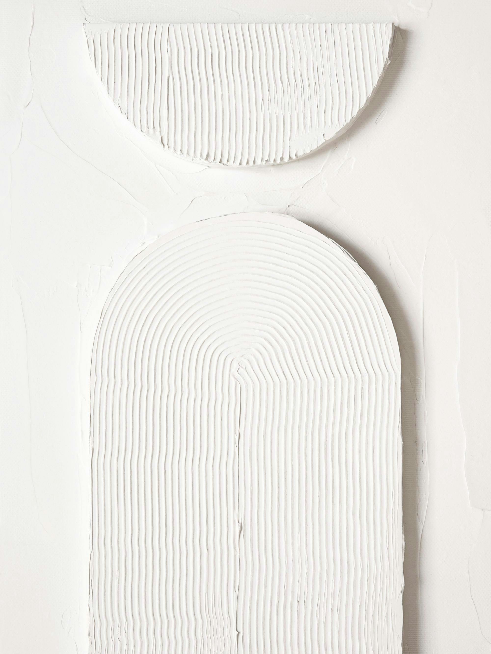 White graphic shapes texture print with rounded paper pieces and shadows on a poster