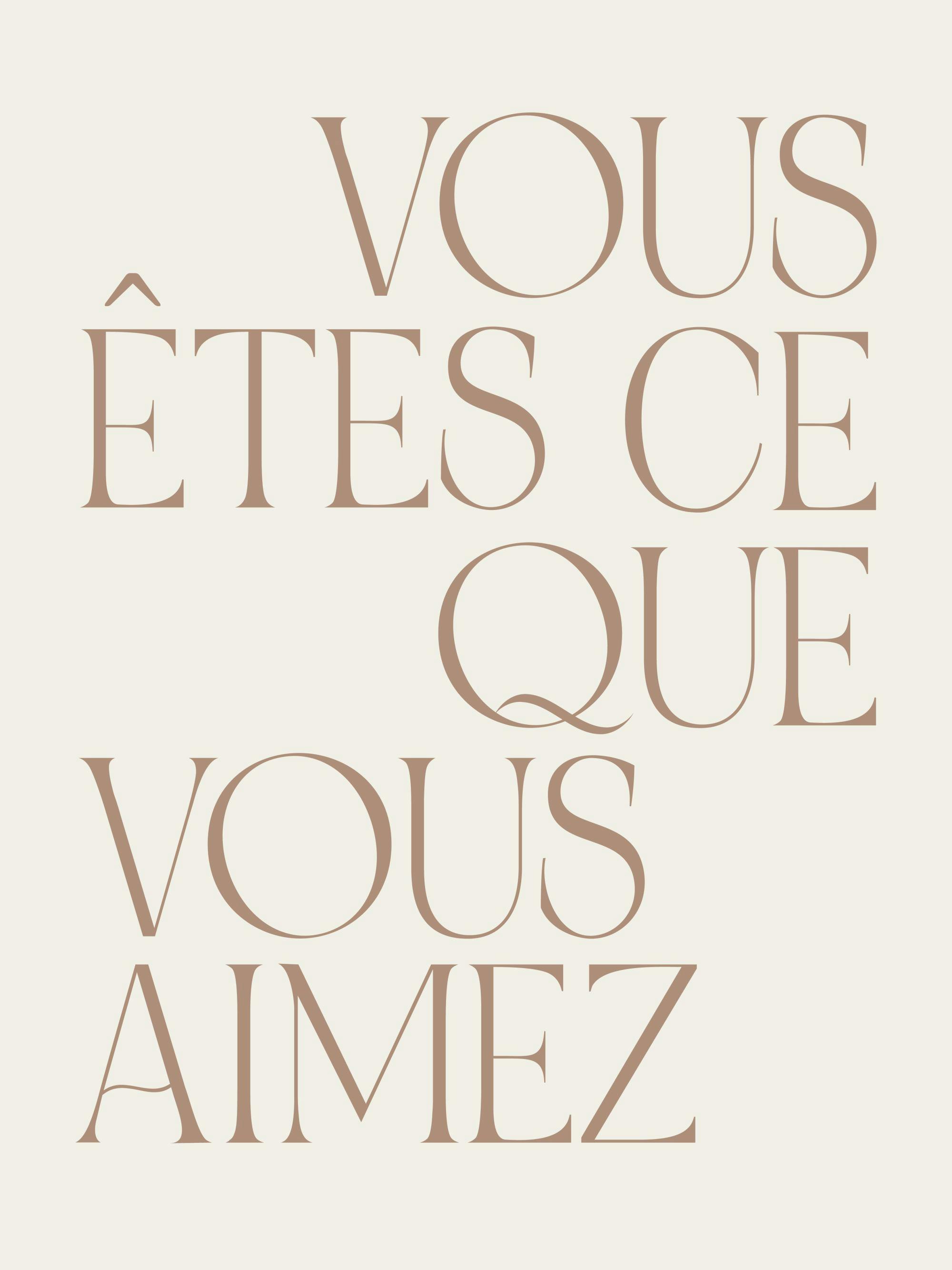 Beige typography print with Vous êtes ce que vous aimez in brown text, meaning You are what you love.