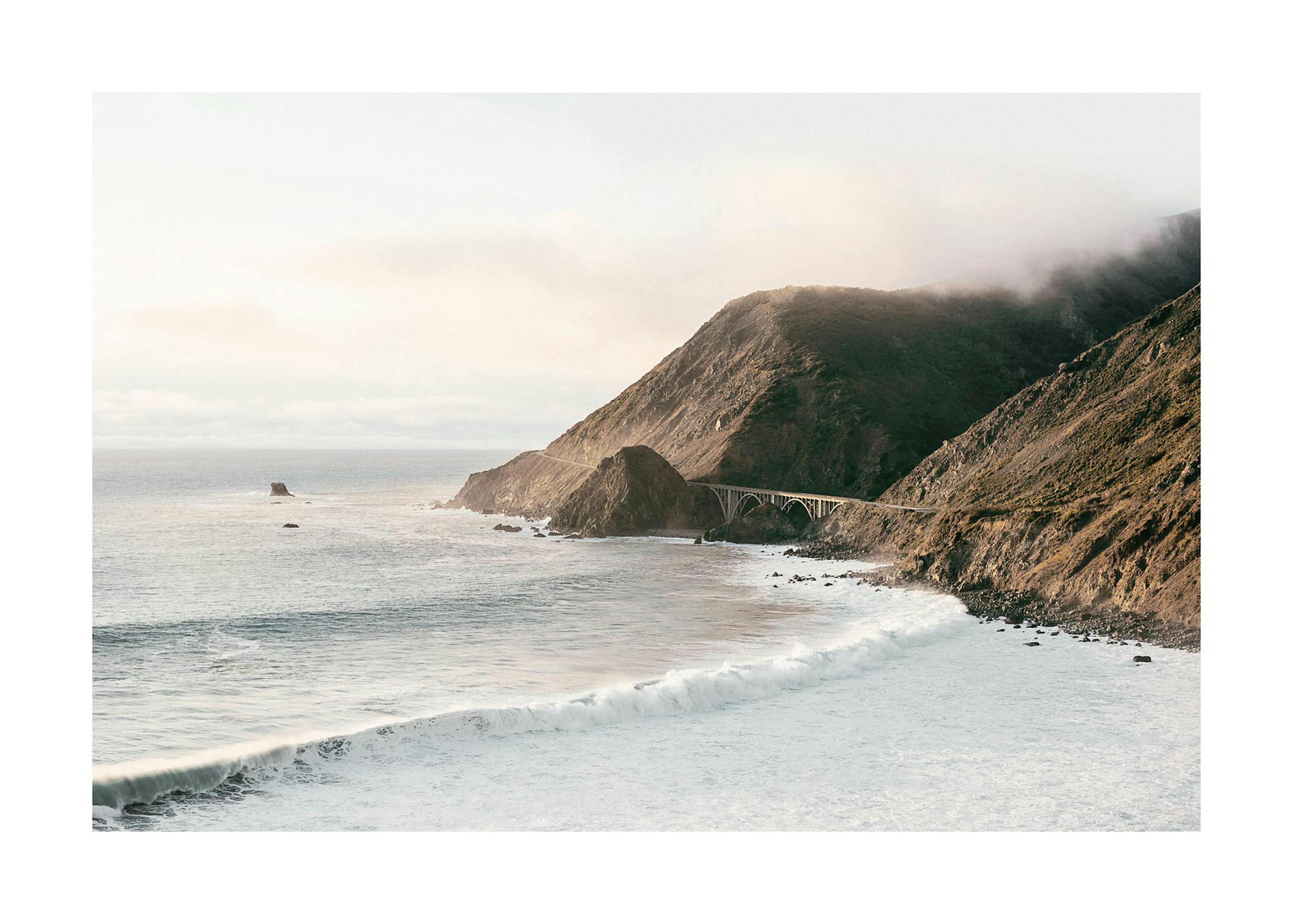 Sunset over Big Sur print, featuring waves, mountains, and a bridge. Photo art poster.