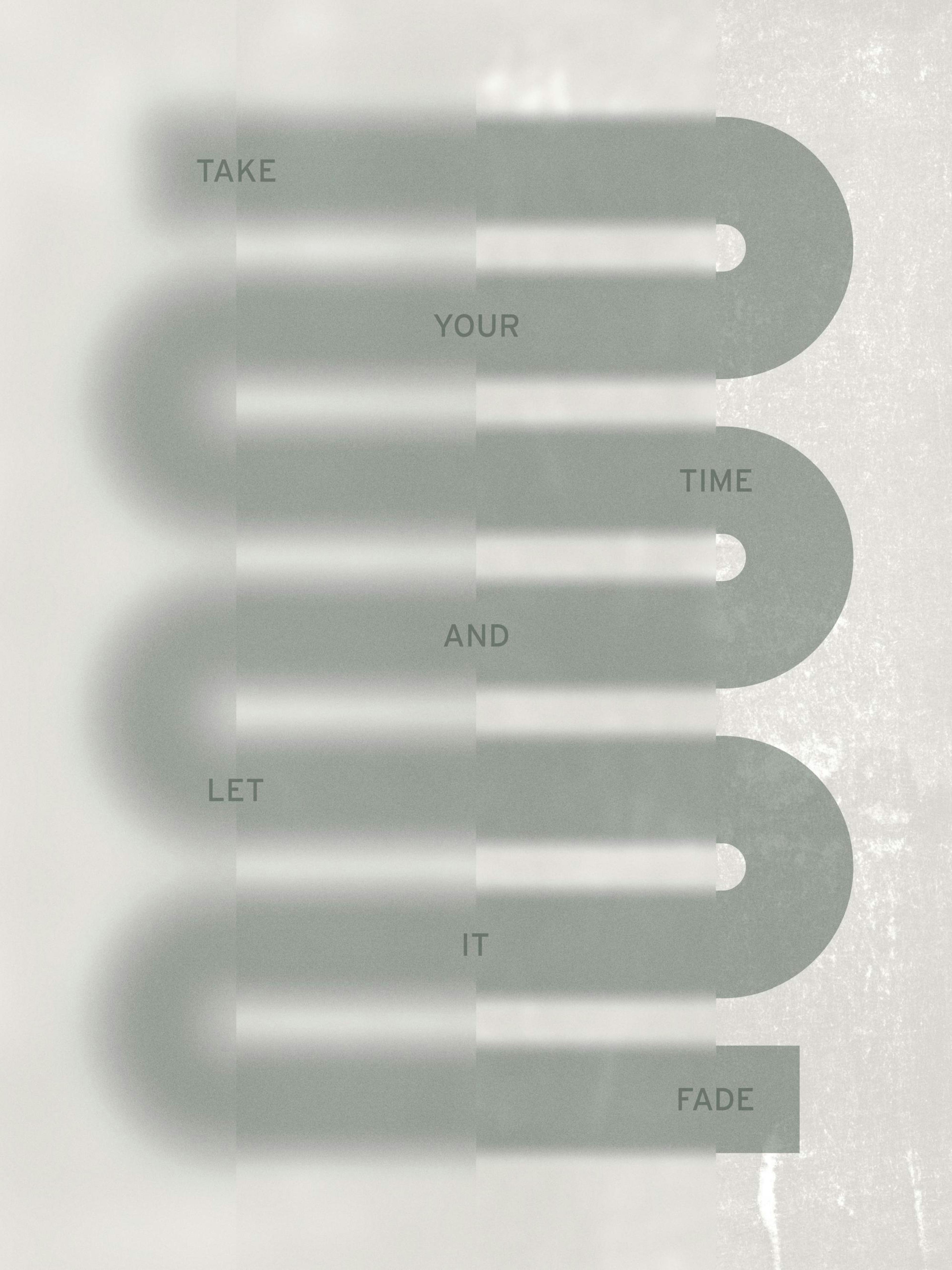 A motivational print with the words Take your time and let it fade on a green wavy pattern, displayed on a wall with shelves.