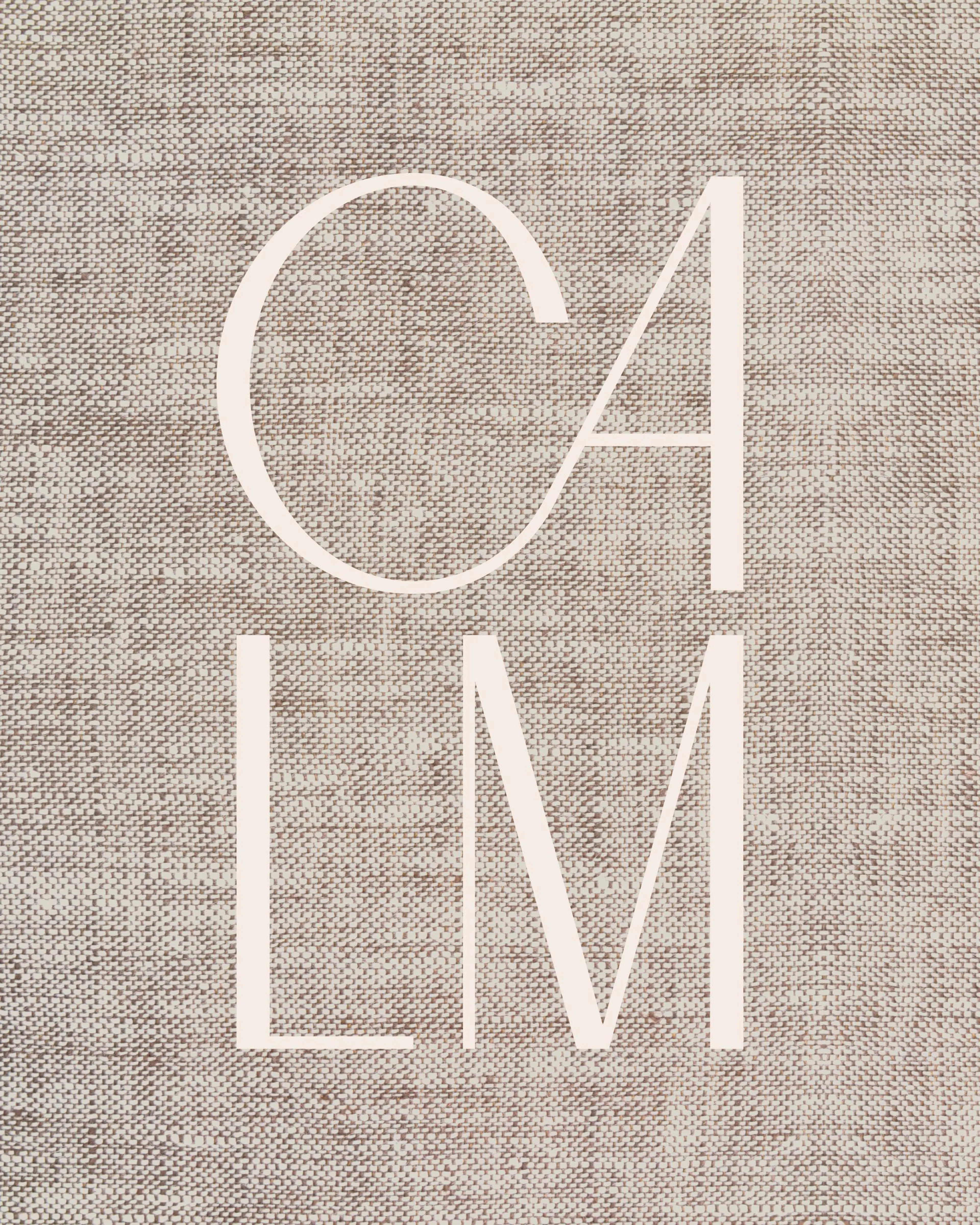 Typography print with CALM in white letters on a textured linen-like background, ideal as a poster print.
