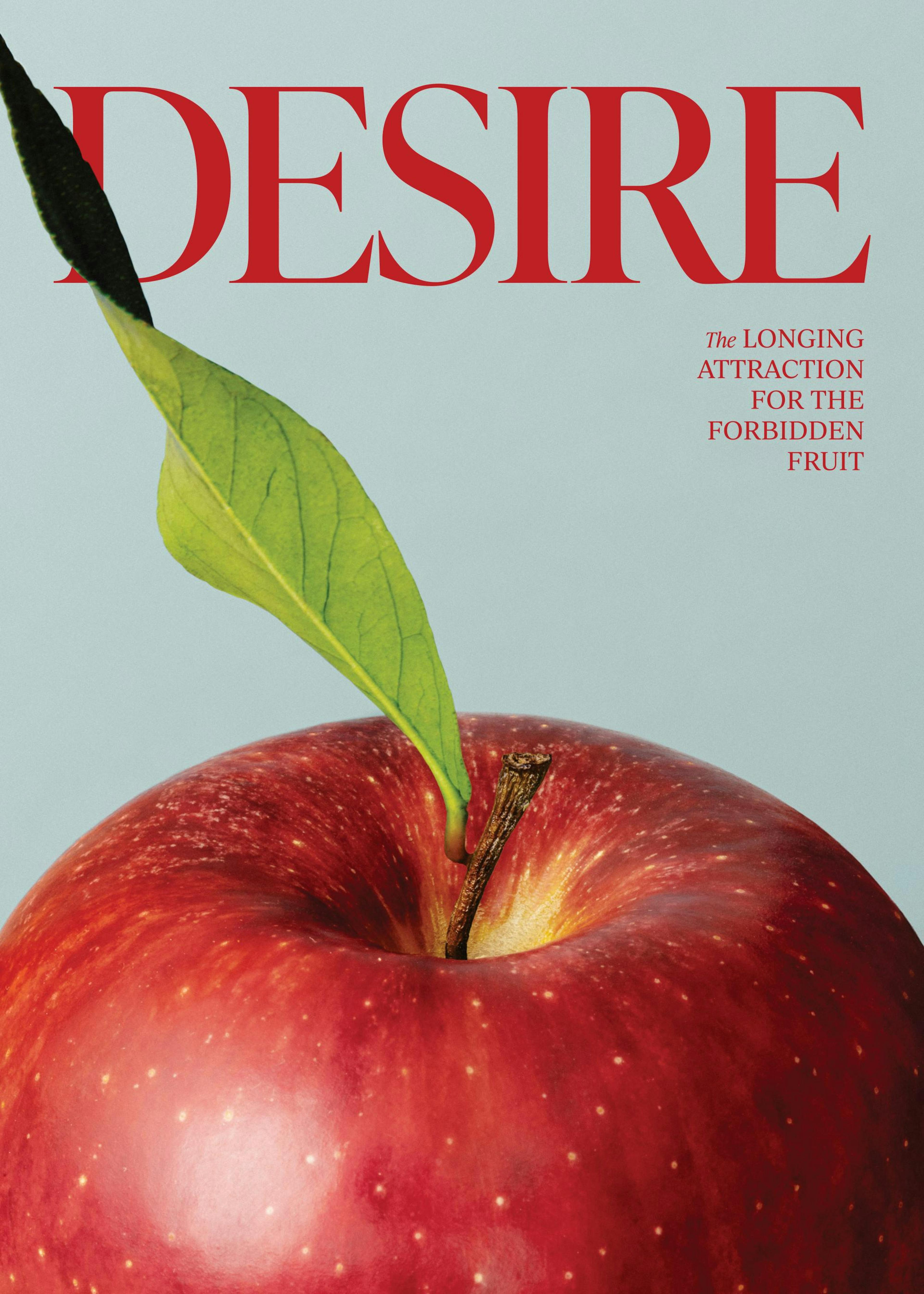 Plakat med et rødt eple og grønt blad, med teksten DESIRE og The longing attraction for the forbidden fruit.
