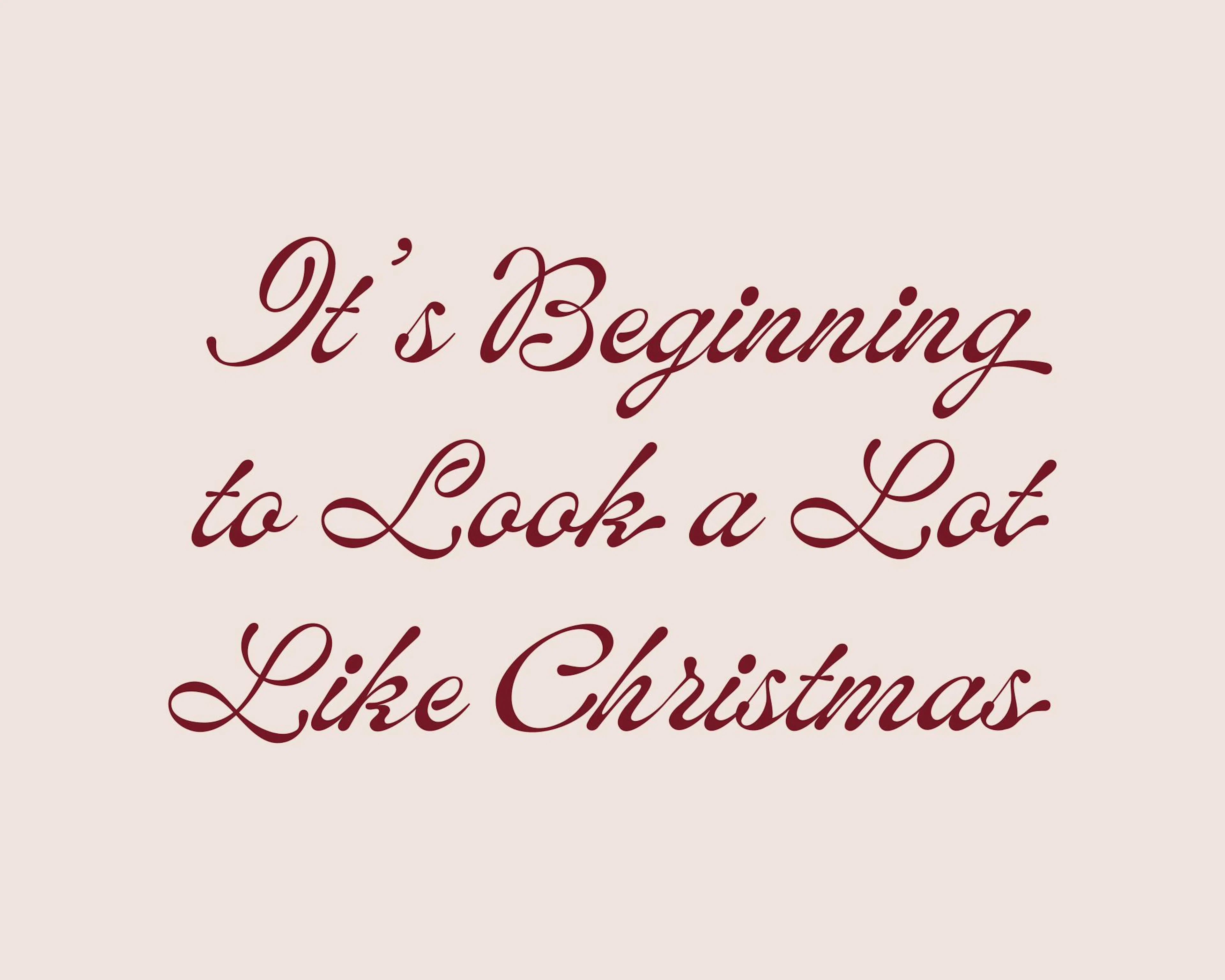 Weihnachtsposter mit Its Beginning to Look a Lot Like Christmas in dunkelroter Schreibschrift auf Cremefarben.