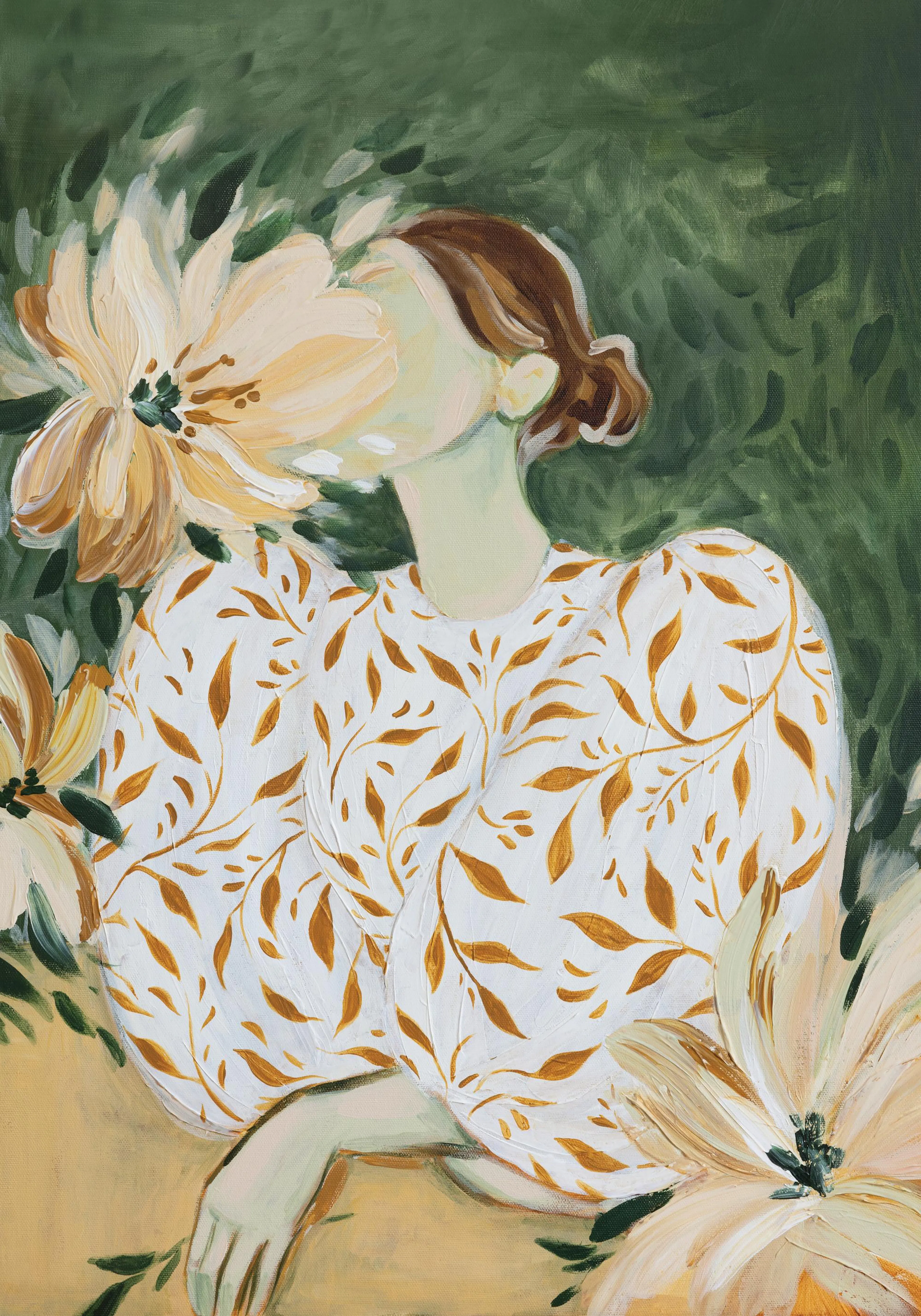 A print of a woman in a floral dress blending with large cream flowers and a lush green background.