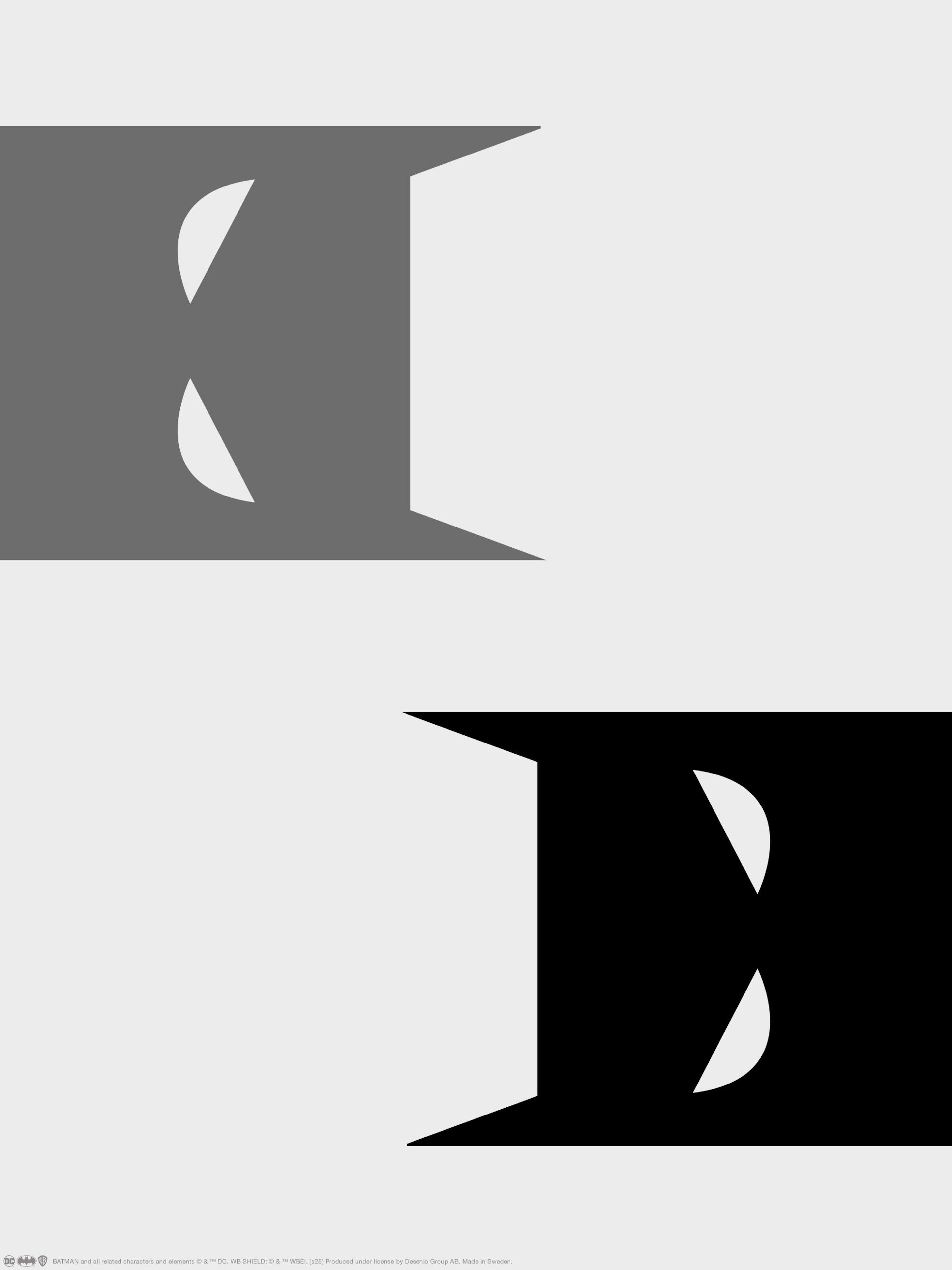 Graphic Batman print with two stylized Batman faces, one grey and one black, on a white background.