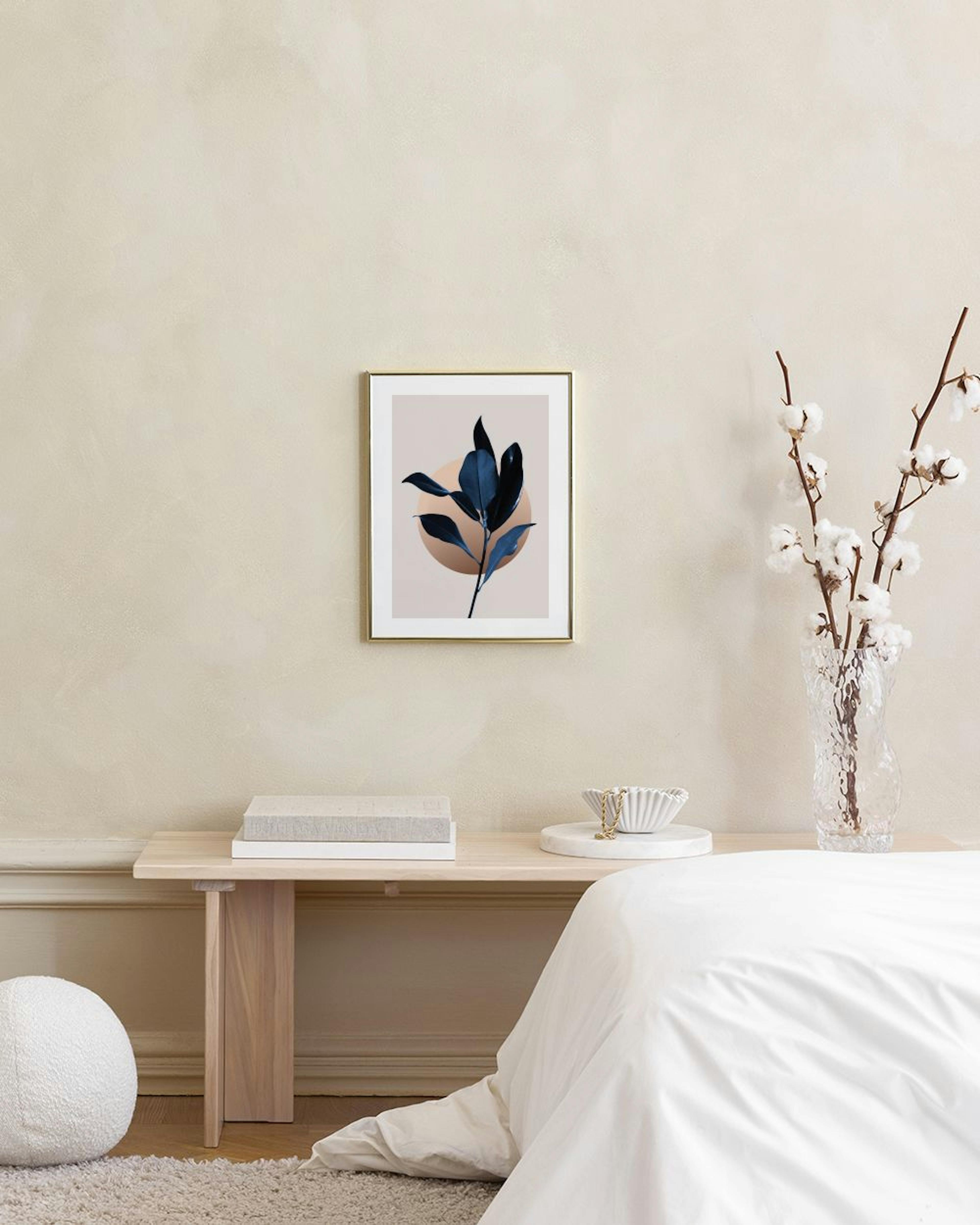 A print of dark blue leaves with a brown circle in the background, hanging in a minimalist living room.