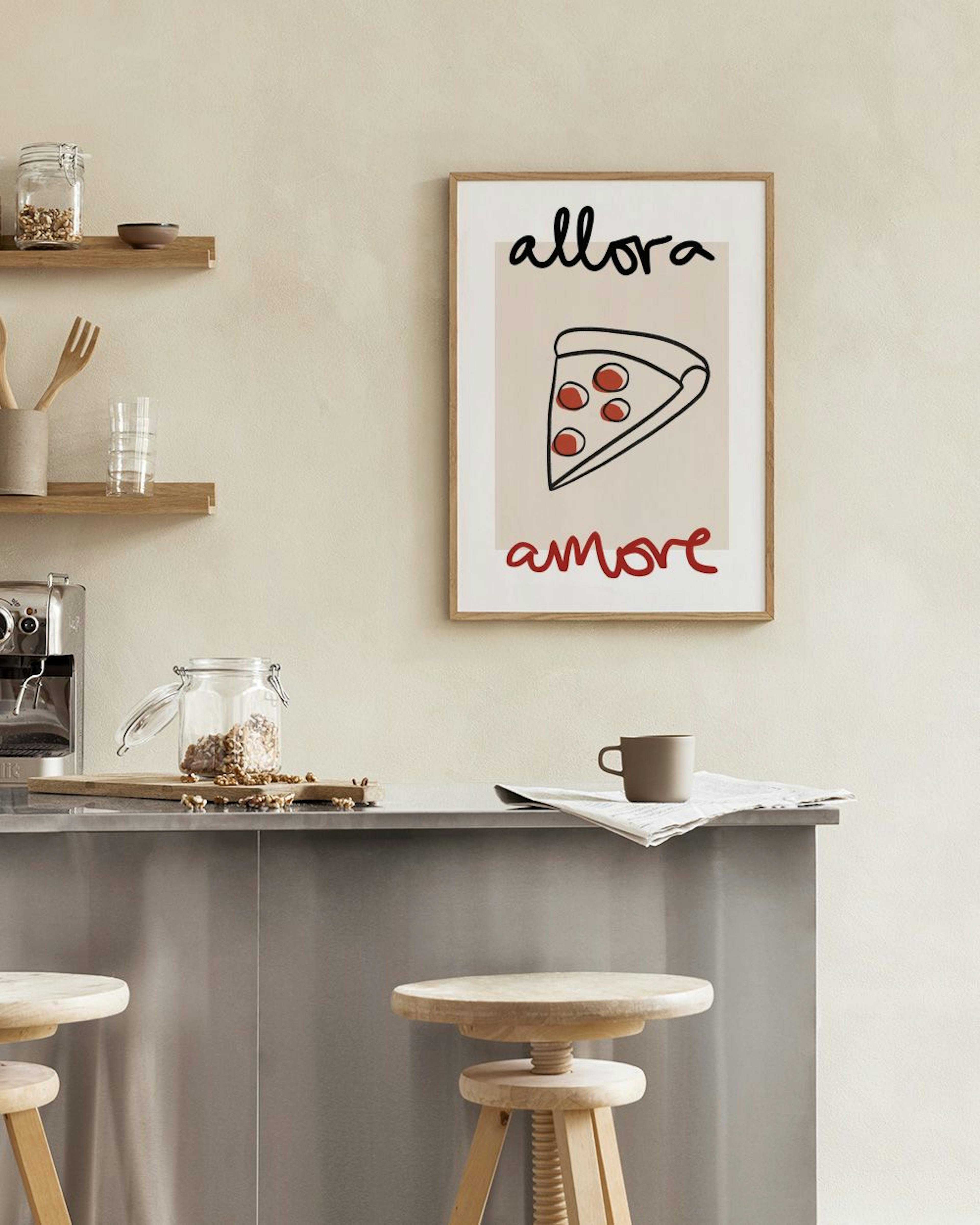 A print of a pizza slice with text allora amore, hanging above a marble side table with vases and books.