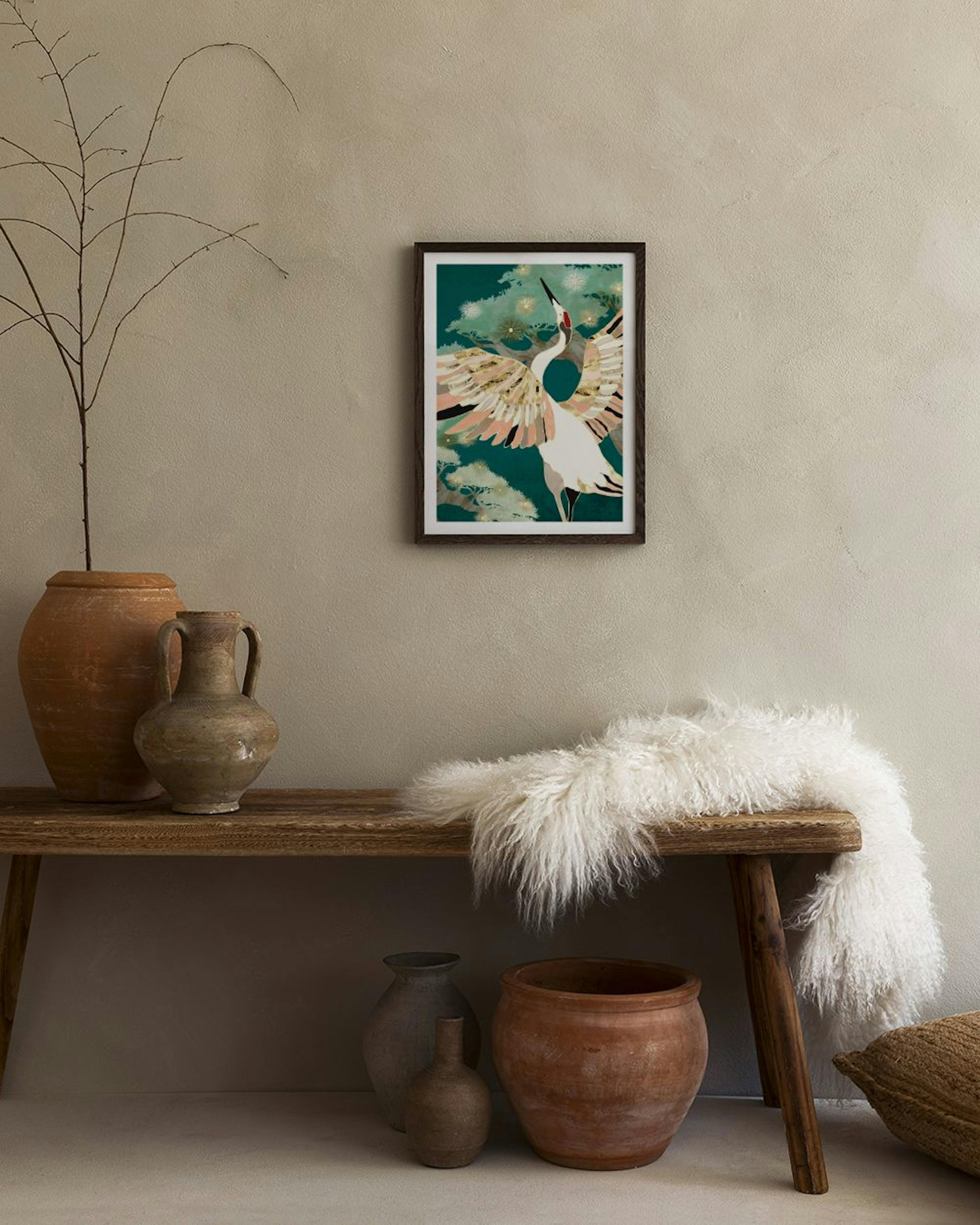Japanese crane print with outstretched wings in white, black, and gold, set against a dark teal background with light green flow