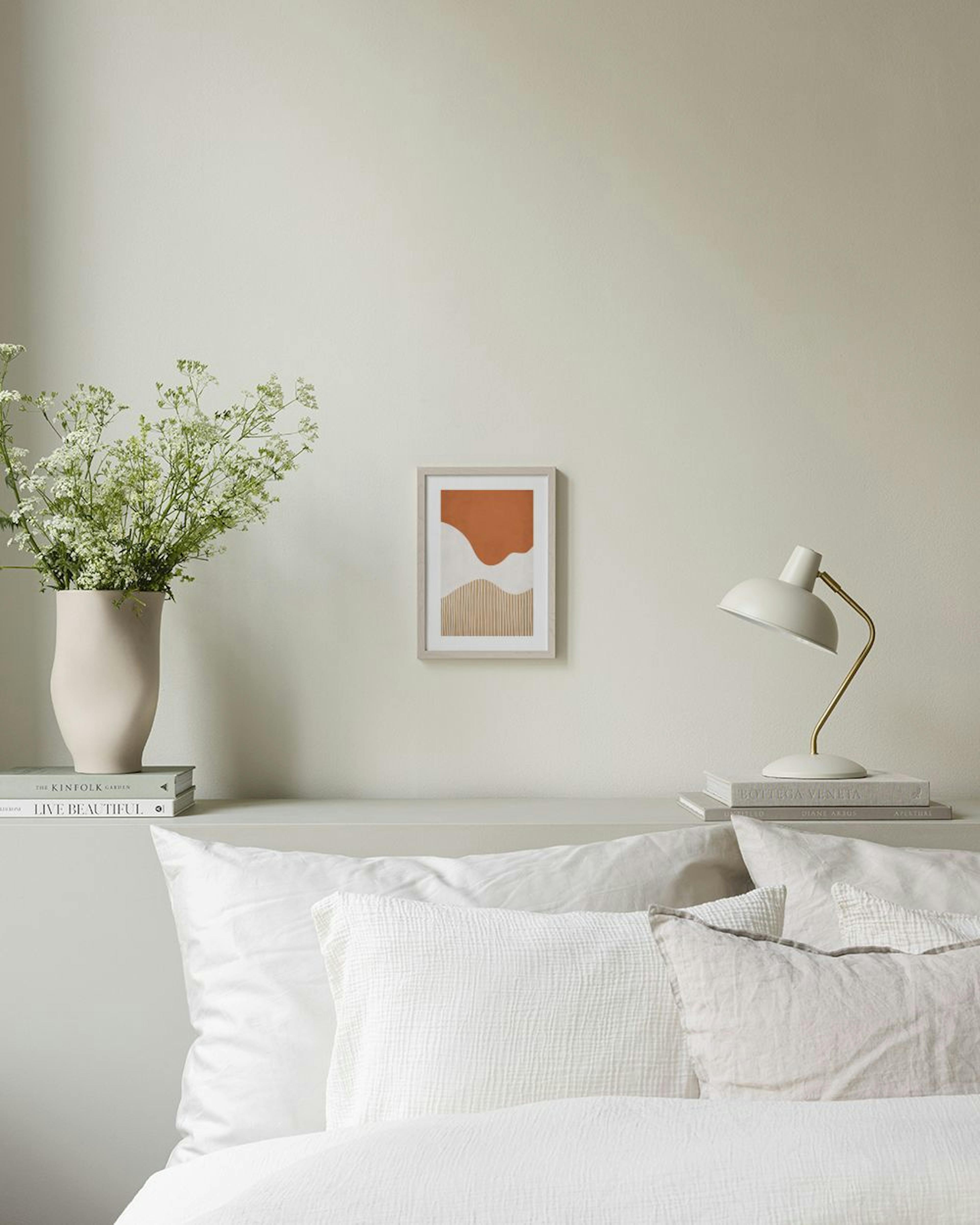 A minimalist print with a rust-orange top, white middle, and a beige bottom with vertical lines, displayed in a modern room.