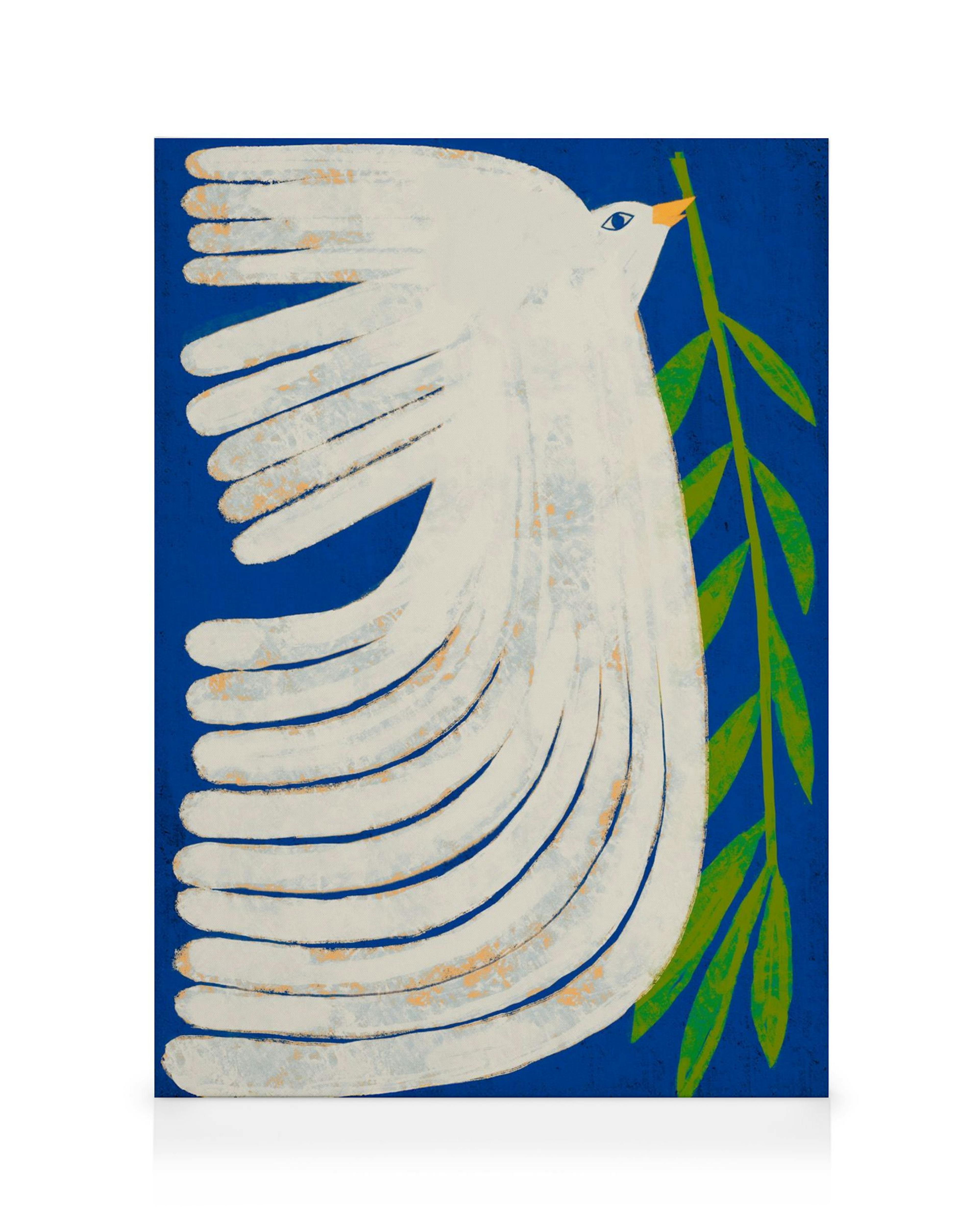 A canvas print portraying a white dove with a green olive branch in its beak against a deep blue background.