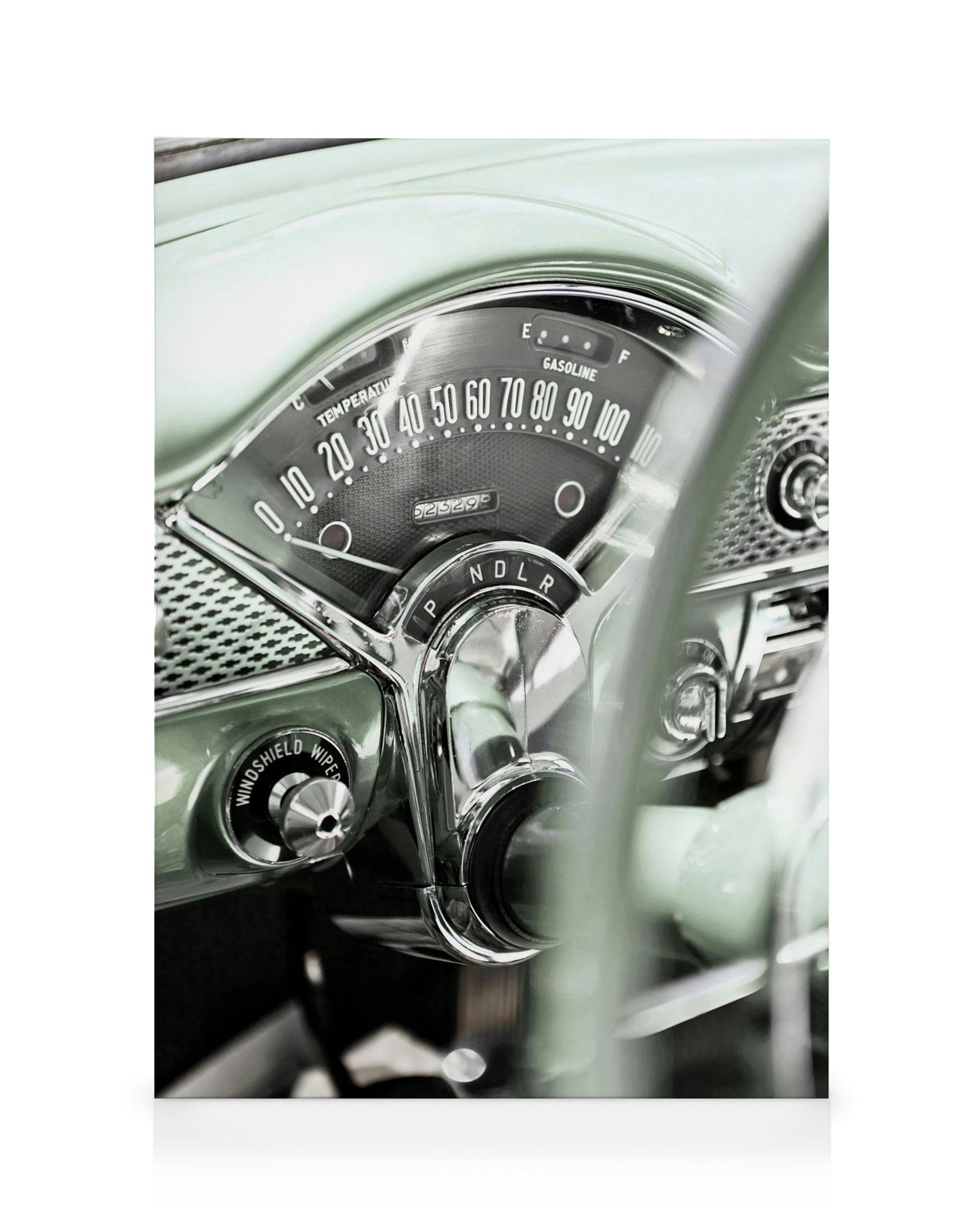 Vintage car dashboard canvas print with green interior, chrome details, and speedometer