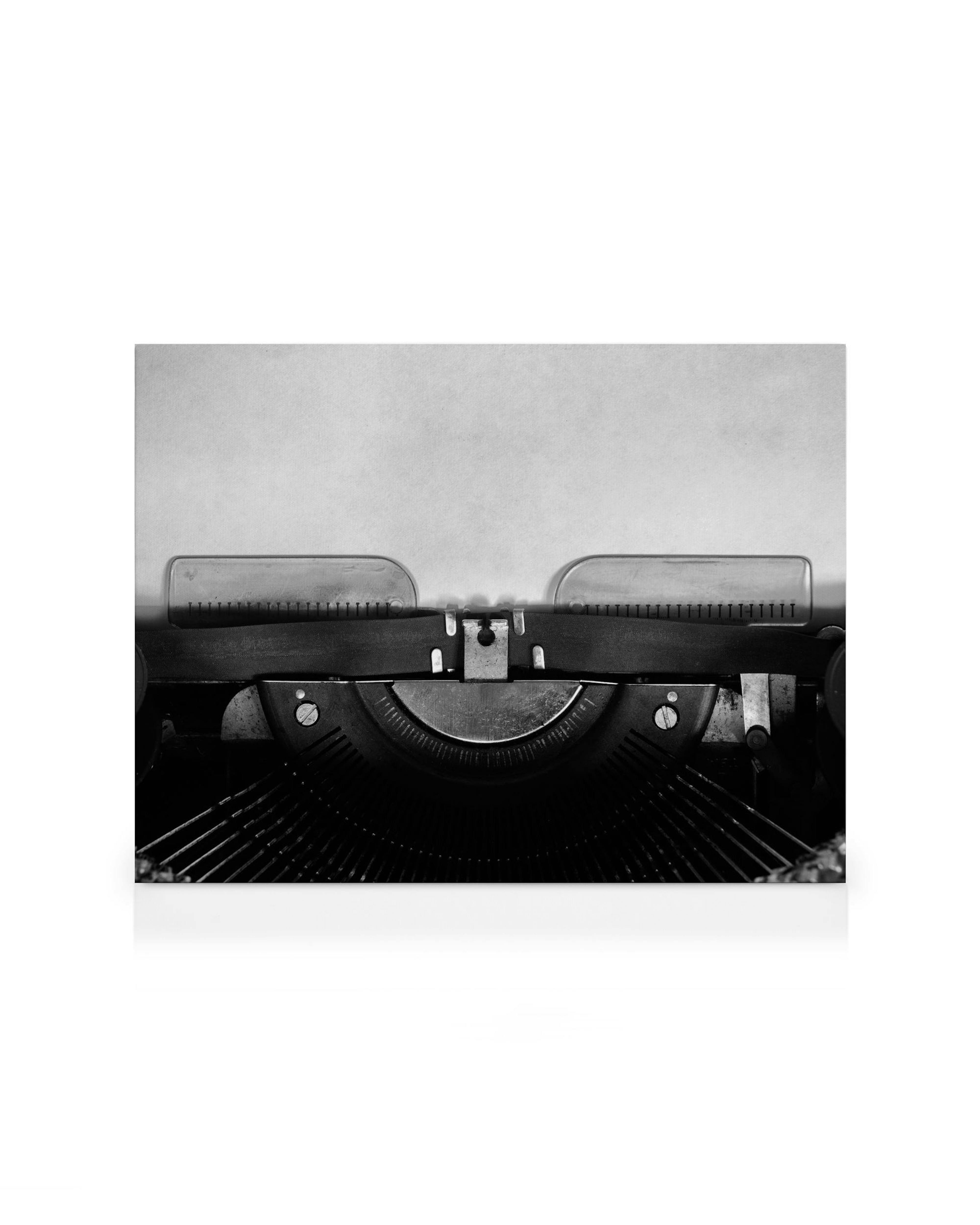 Stampa vintage in bianco e nero su tela con interno di una vecchia macchina da scrivere, tasti rotondi, barre metalliche.