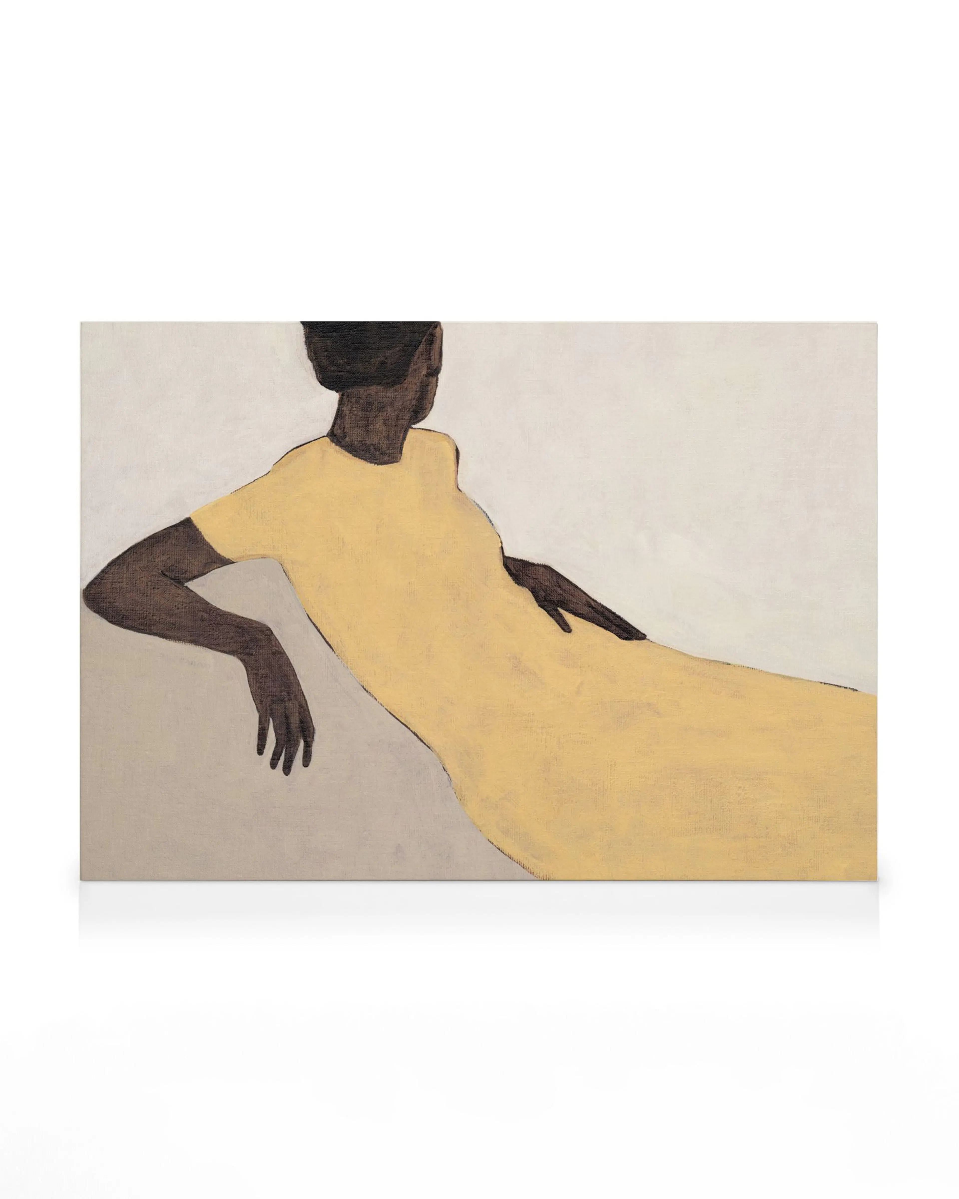 A canvas print featuring a minimalist illustration of a person with dark skin and hair, wearing a loose yellow dress, reclining.