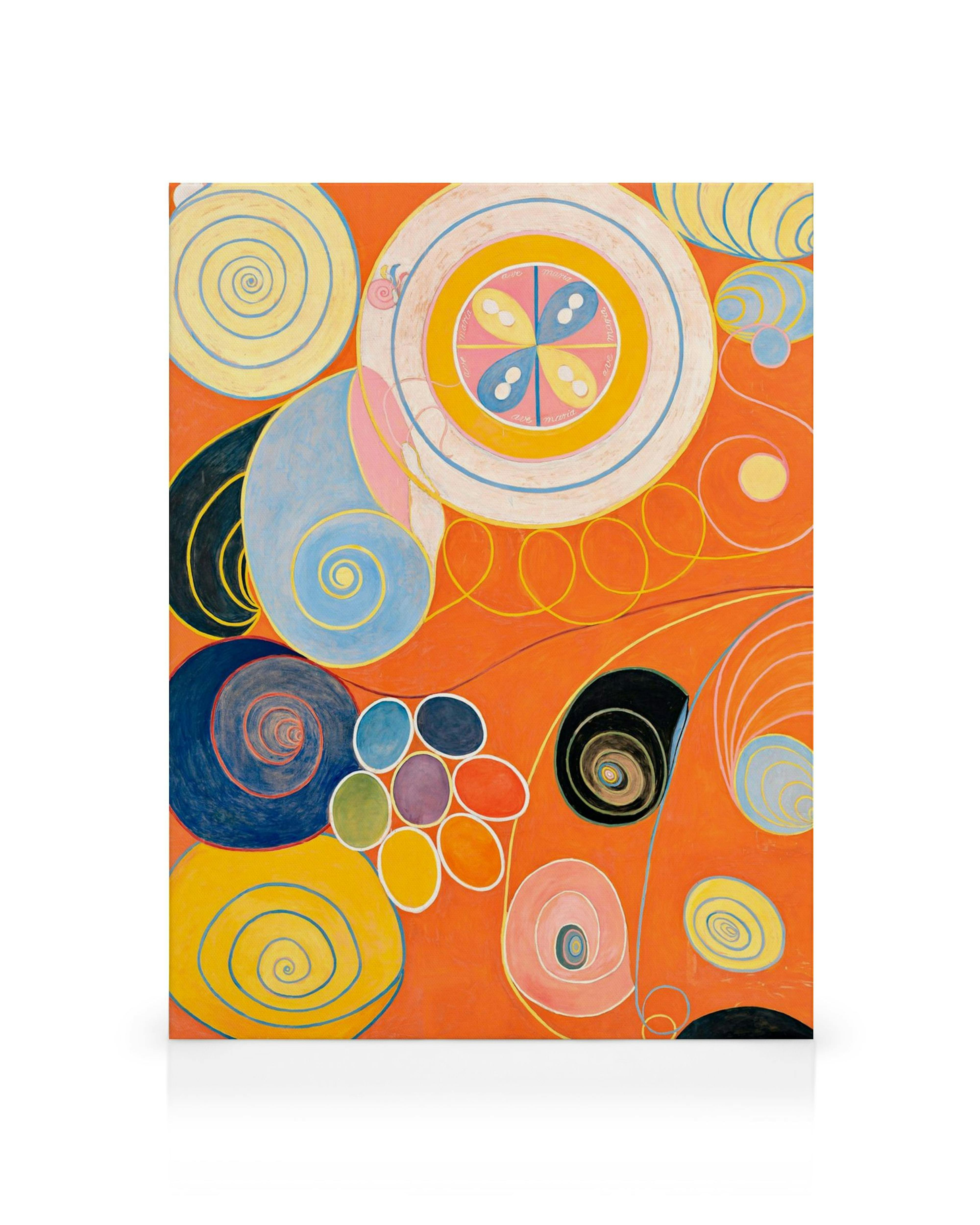 Abstract canvas print with orange, blue, yellow, and pink swirls and circles, some patterned, some solid.