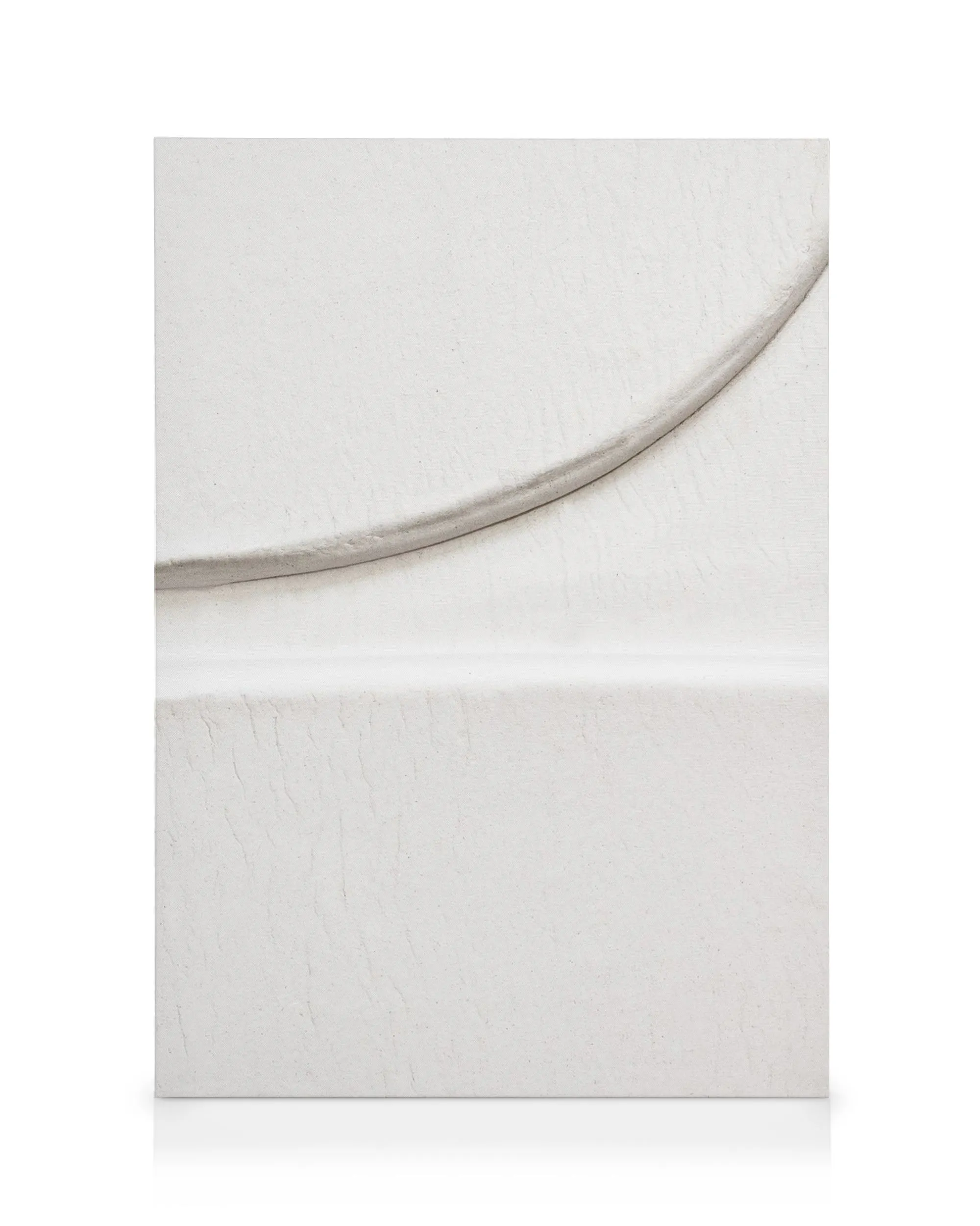 Minimalistic white canvas print with a subtle curved line and textured surface, creating a calming aesthetic.