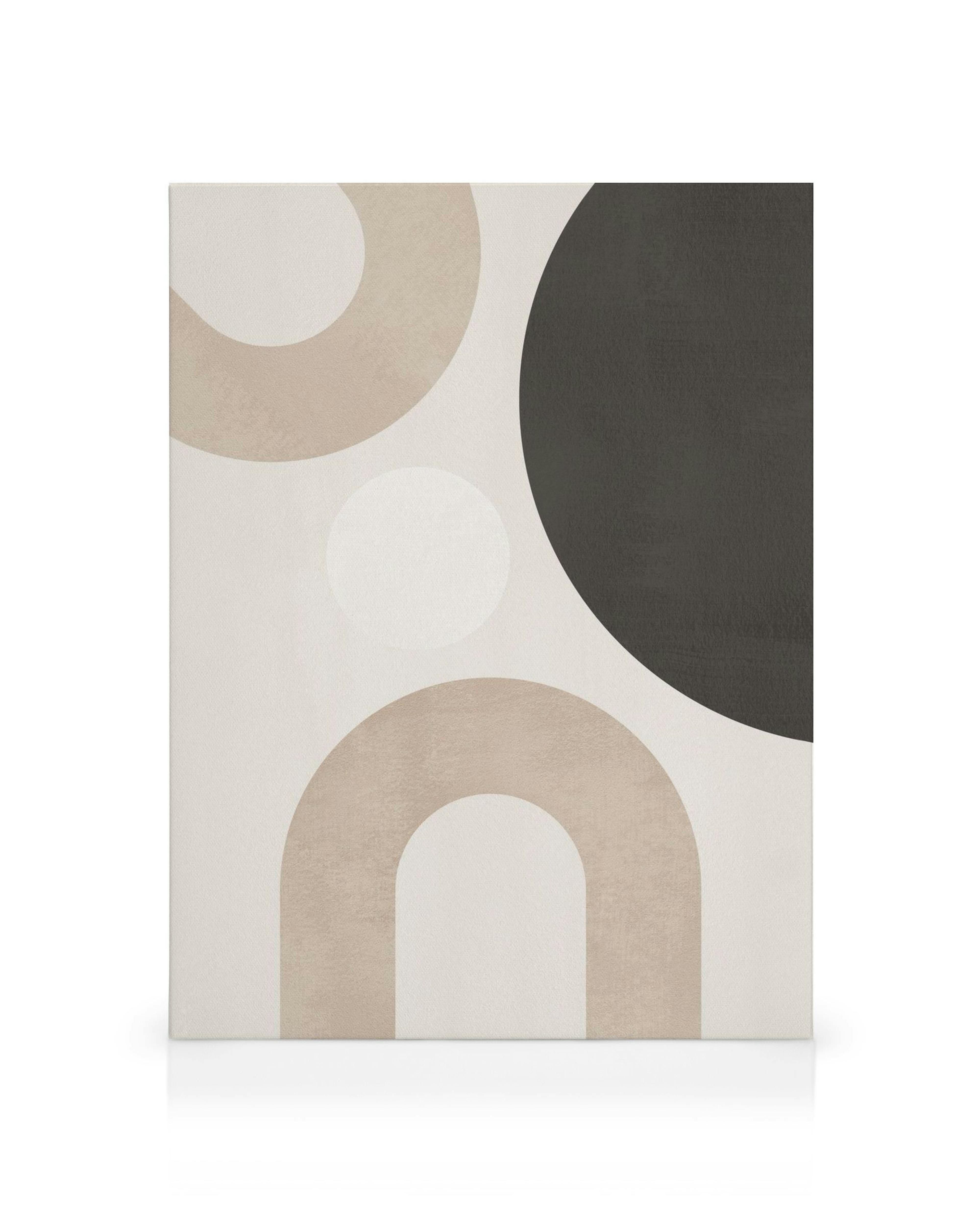 Abstract canvas print with muted beige and black geometric shapes on an off-white background